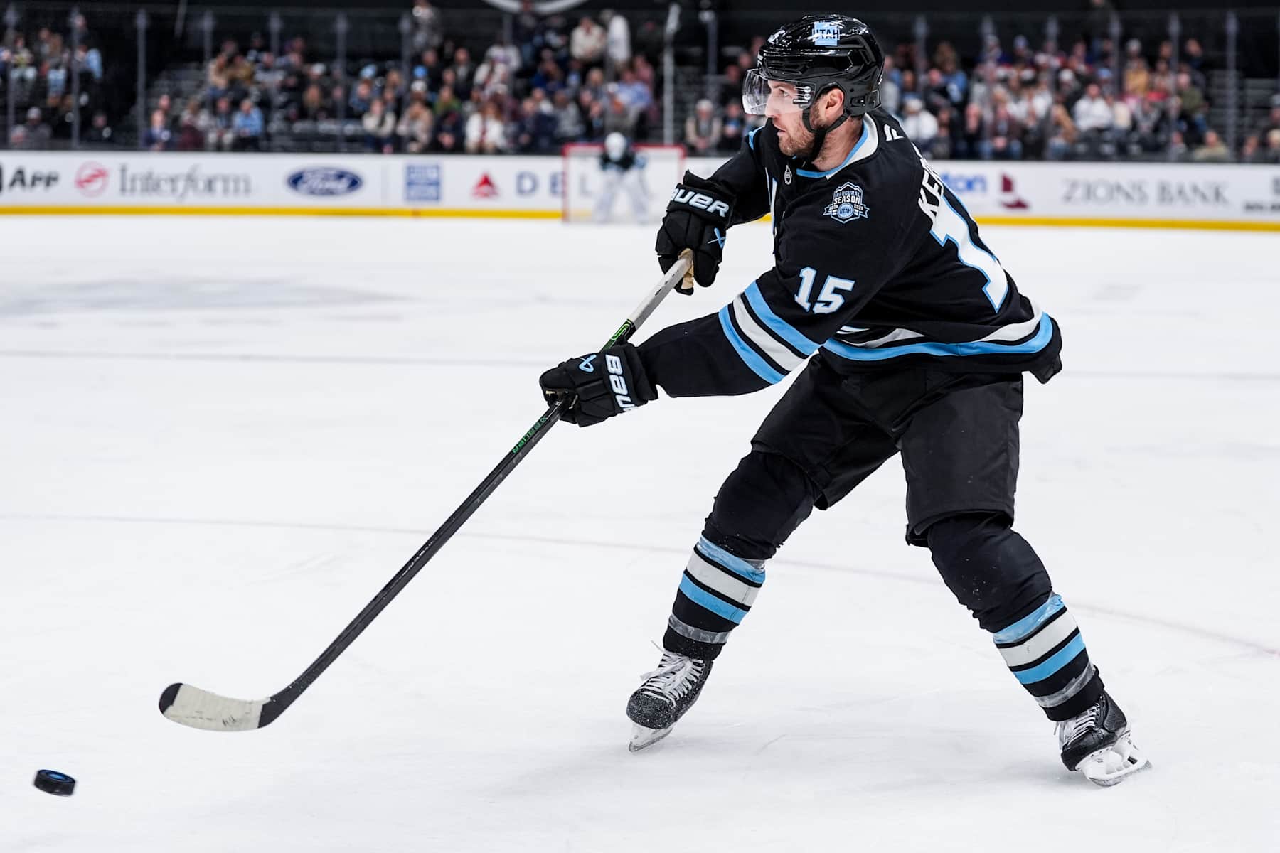 SALT LAKE CITY, UTAH - JANUARY 11: Alex Kerfoot #15 of the Utah Hockey Club passes the puck during the second period against the New York Islanders on January 11, 2025 at Delta Center in Salt Lake City, Utah. (Photo by Hunter Dyke/NHLI via Getty Images)