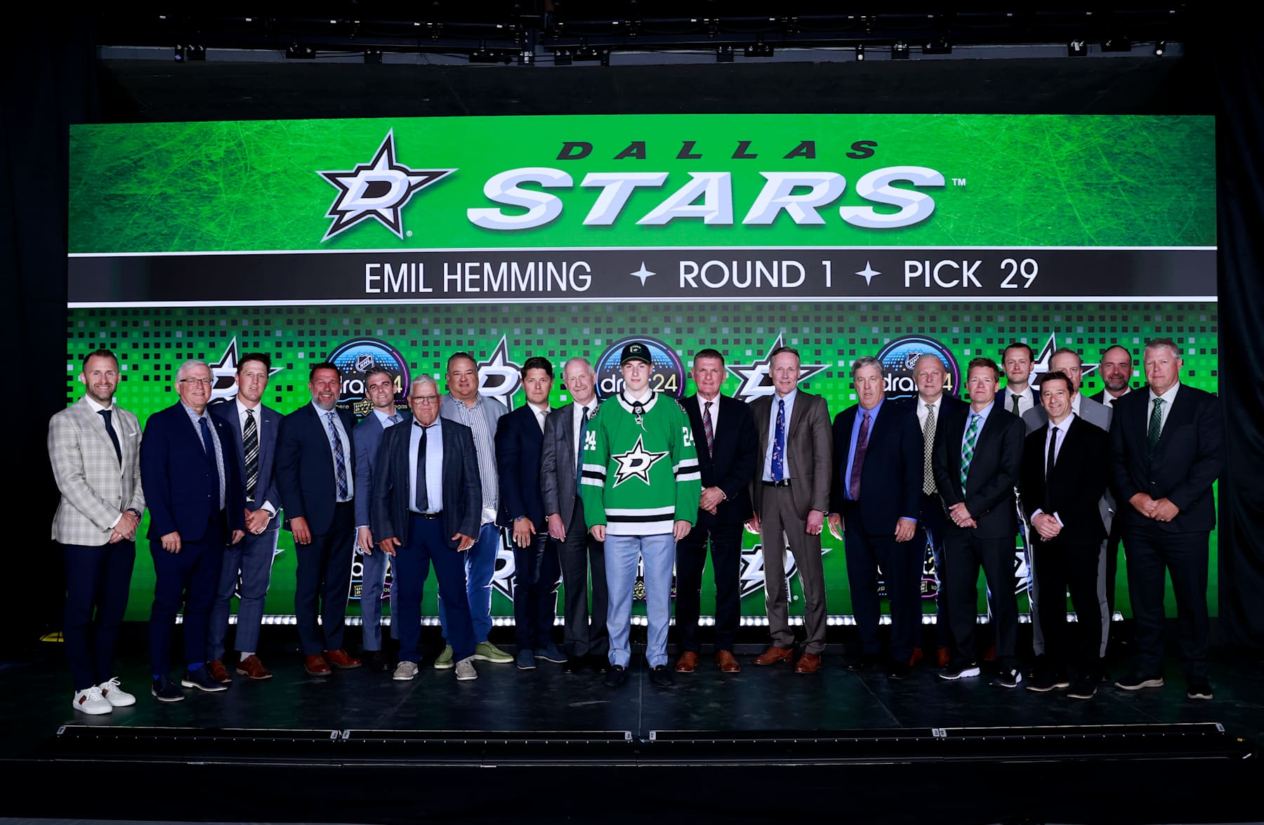 LAS VEGAS, NEVADA - JUNE 28: Emil Hemming poses for a group photo with general manager Jim Nill and team personnel after being selected 29th overall by the Dallas Stars during the first round of the 2024 Upper Deck NHL Draft at Sphere on June 28, 2024 in Las Vegas, Nevada. (Photo by Jeff Vinnick/NHLI via Getty Images)
