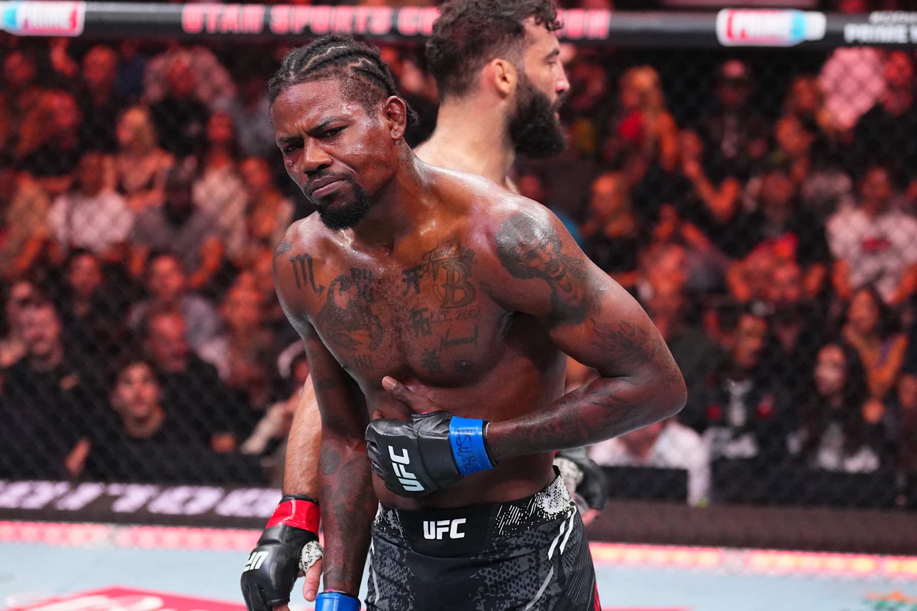 Kevin Holland reacts after suffering an injury against Roman Dolidze