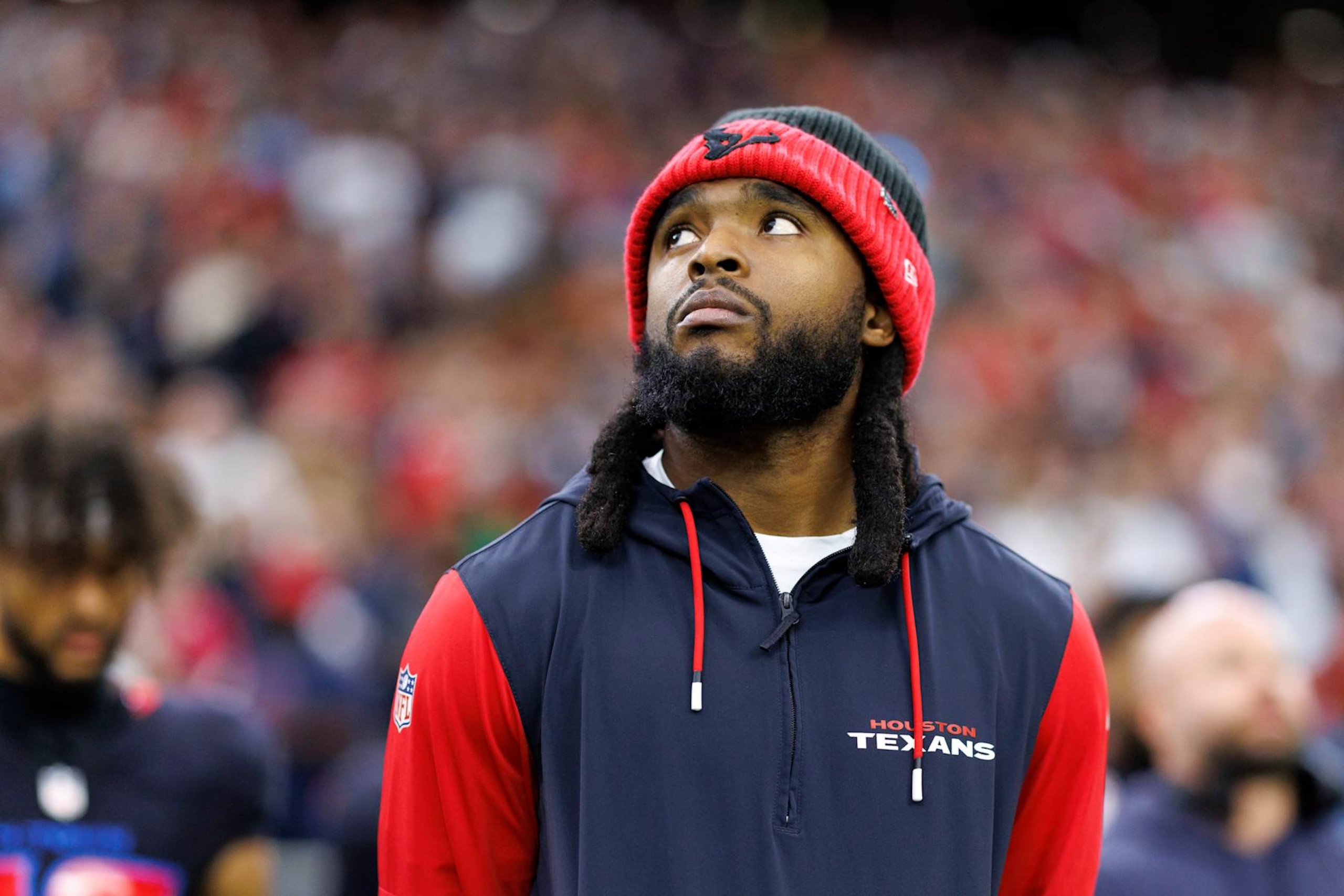 HOUSTON, TEXAS - DECEMBER 25: Wide receiver Diontae Johnson #18 of the Houston Texans stands on the sidelines during the national anthem prior to an NFL football game against the Baltimore Ravens, at NRG Stadium on December 25, 2024 in Houston, Texas. (Photo by Brooke Sutton/Getty Images) HOUSTON, TEXAS - DECEMBER 25: Wide receiver Diontae Johnson #18 of the Houston Texans stands on the sidelines during the national anthem prior to an NFL football game against the Baltimore Ravens, at NRG Stadium on December 25, 2024 in Houston, Texas. (Photo by Brooke Sutton/Getty Images)
