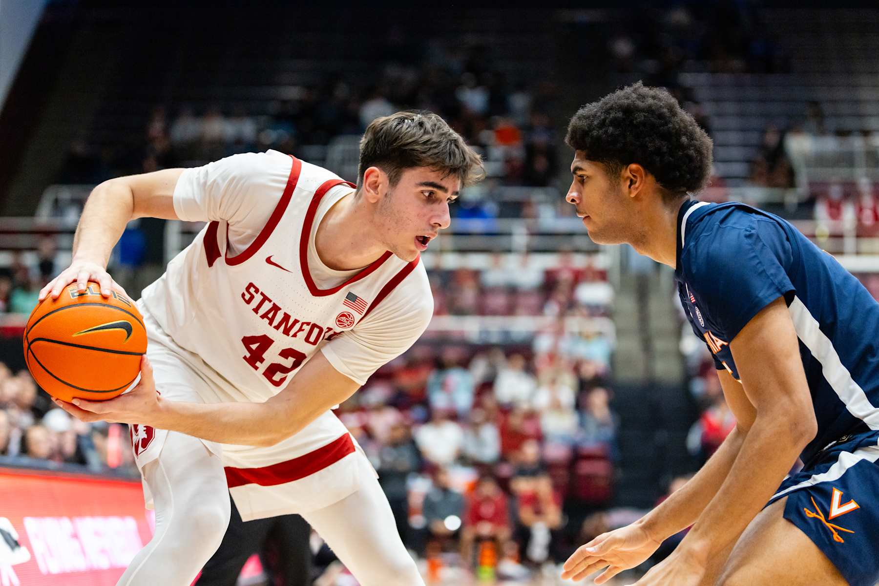 PALO ALTO, CA - JANUARY 11: Stanford Cardinal forward Maxime Raynaud (42) goes against Virginia Cavaliers forward Jacob Cofie (5) during a basketball game on January 11, 2025 at Maples Pavilion in Palo Alto, CA. (Photo by Matthew Huang/Icon Sportswire via Getty Images) PALO ALTO, CA - JANUARY 11: Stanford Cardinal forward Maxime Raynaud (42) goes against Virginia Cavaliers forward Jacob Cofie (5) during a basketball game on January 11, 2025 at Maples Pavilion in Palo Alto, CA. (Photo by Matthew Huang/Icon Sportswire via Getty Images)