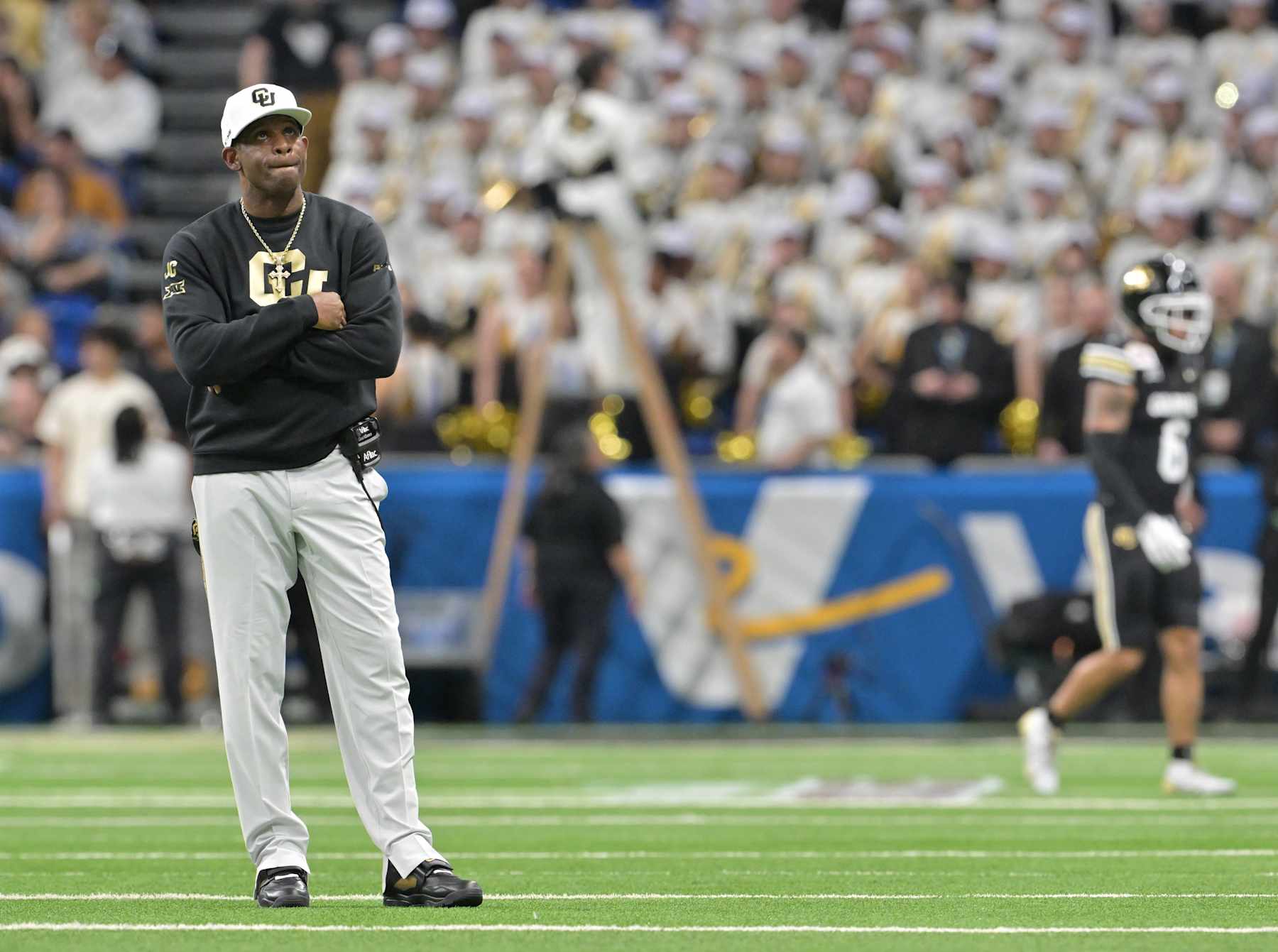 SAN ANTONIO, TEXAS - DECEMBER 28: Colorado Buffaloes head coach Deion Sanders watches a replay after Brigham Young Cougars wide receiver Parker Kingston (11) ran back a punt for a touchdown at the Alamodome in San Antonio, Texas on December 28, 2024. The Colorado Buffaloes played the Brigham Young Cougars in the Valero Alamo Bowl. (Photo by RJ Sangosti/MediaNews Group/The Denver Post via Getty Images)