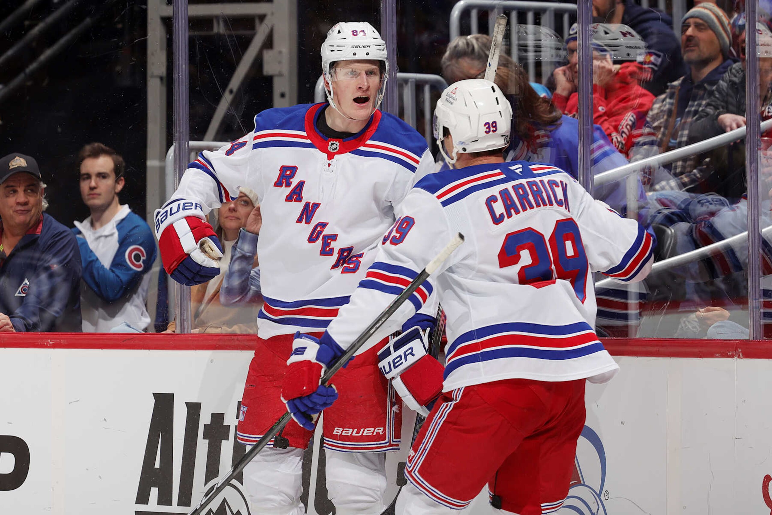DENVER, COLORADO - JANUARY 14: Adam Edstrom #84 and Sam Carrick #39 of the New York Rangers celebrate a goal against the Colorado Avalanche at Ball Arena on January 14, 2025 in Denver, Colorado. (Photo by Michael Martin/NHLI via Getty Images) DENVER, COLORADO - JANUARY 14: Adam Edstrom #84 and Sam Carrick #39 of the New York Rangers celebrate a goal against the Colorado Avalanche at Ball Arena on January 14, 2025 in Denver, Colorado. (Photo by Michael Martin/NHLI via Getty Images)