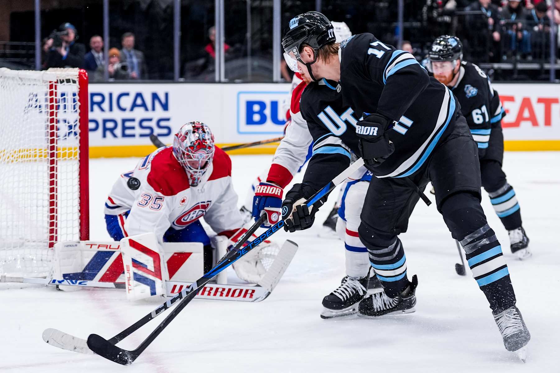 SALT LAKE CITY, UTAH - JANUARY 14: Nick Bjugstad #17 of the Utah Hockey Club shoots the puck and scores a goal during the first period against the Montreal Canadiens on January 14, 2025 at Delta Center in Salt Lake City, Utah. (Photo by Hunter Dyke/NHLI via Getty Images)