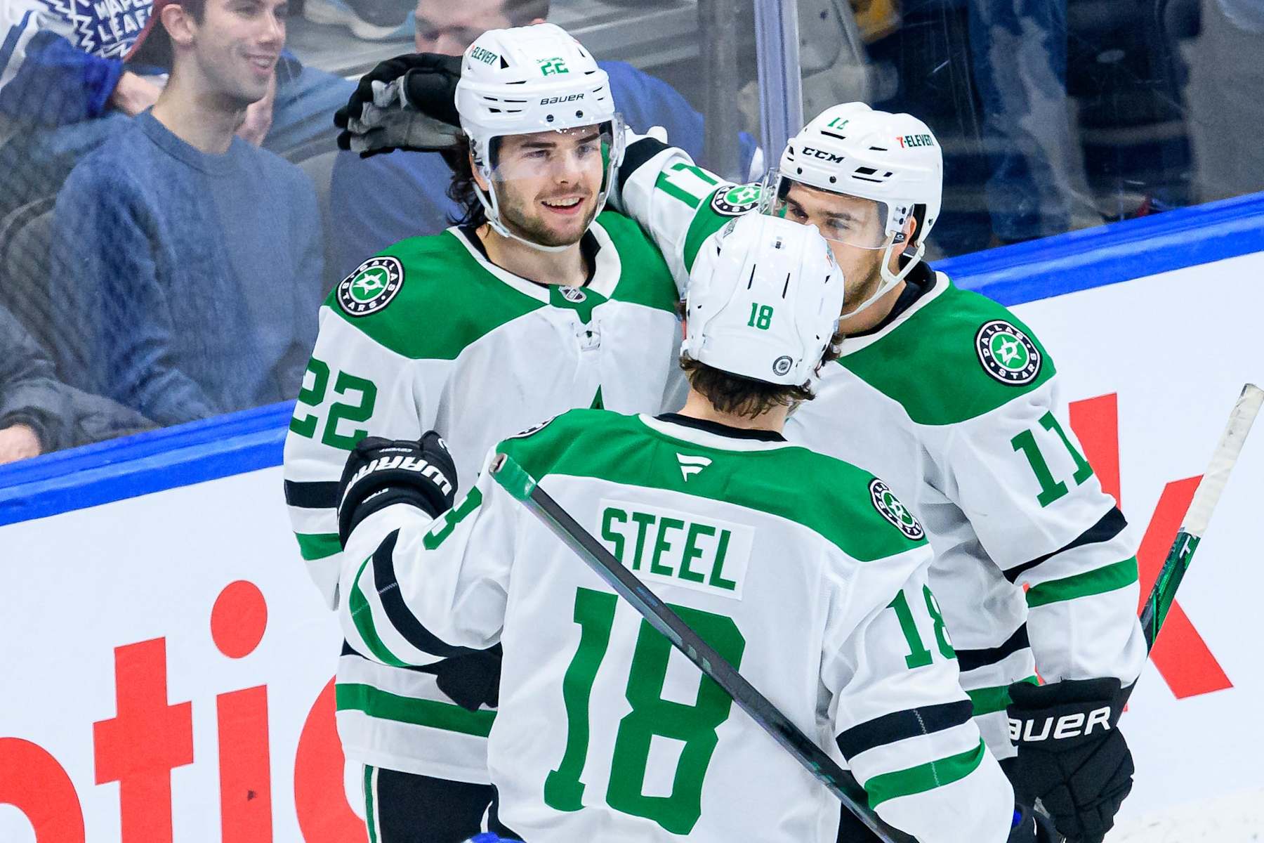 TORONTO, ON - JANUARY 14: Dallas Stars Center Mavrik Bourque (22) celebrates his goal with Left Wing Sam Steel (18) and Right Wing Logan Stankoven (11) during the NHL regular season game between the Dallas Stars and the Toronto Maple Leafs on January 14, 2025, at Scotiabank Arena in Toronto, ON, Canada. (Photo by Julian Avram/Icon Sportswire via Getty Images)