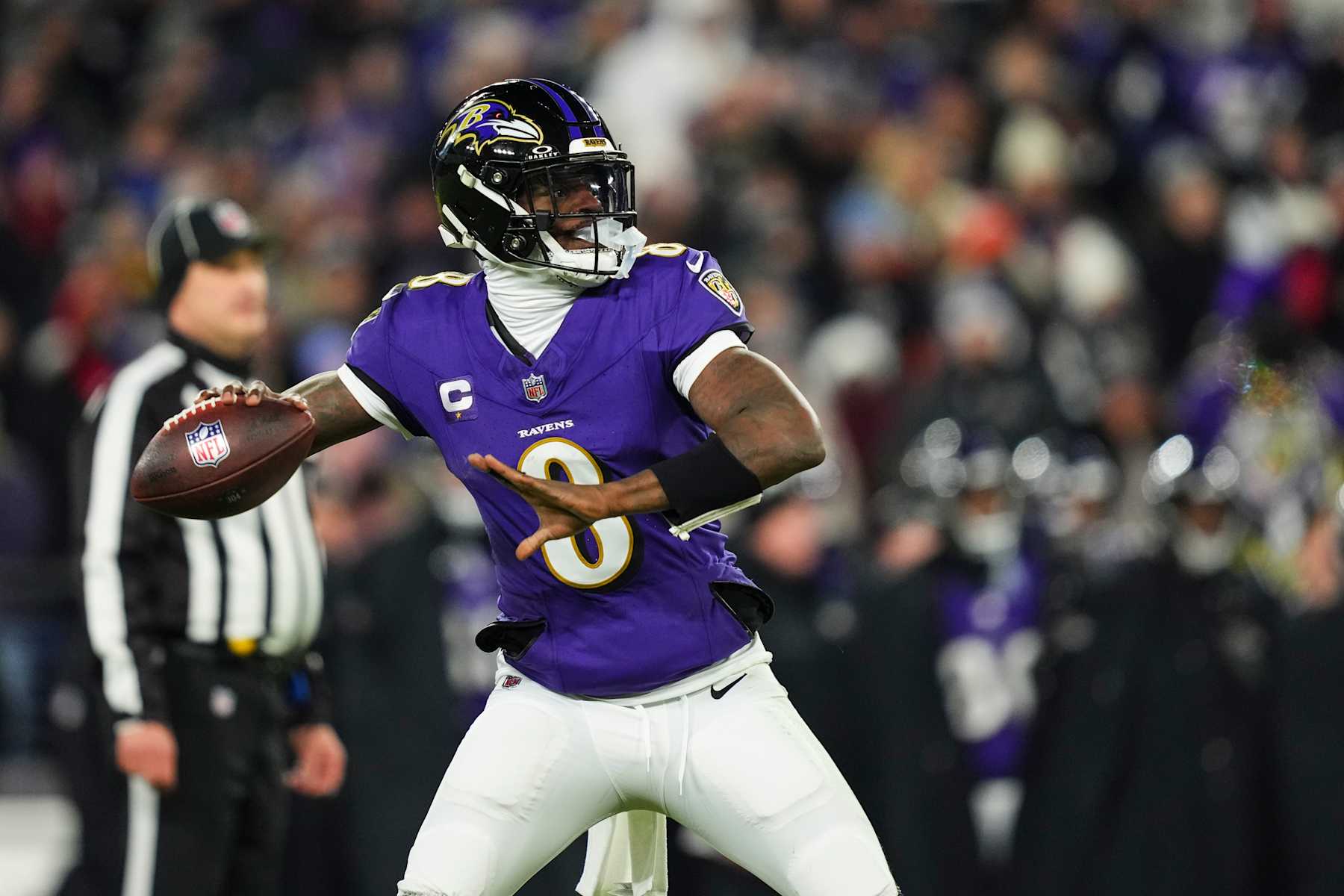 BALTIMORE, MD - JANUARY 11: Lamar Jackson #8 of the Baltimore Ravens throws the ball during an NFL football wild card playoff game against the Pittsburgh Steelers at M&T Bank Stadium on January 11, 2025 in Baltimore, Maryland. (Photo by Cooper Neill/Getty Images)