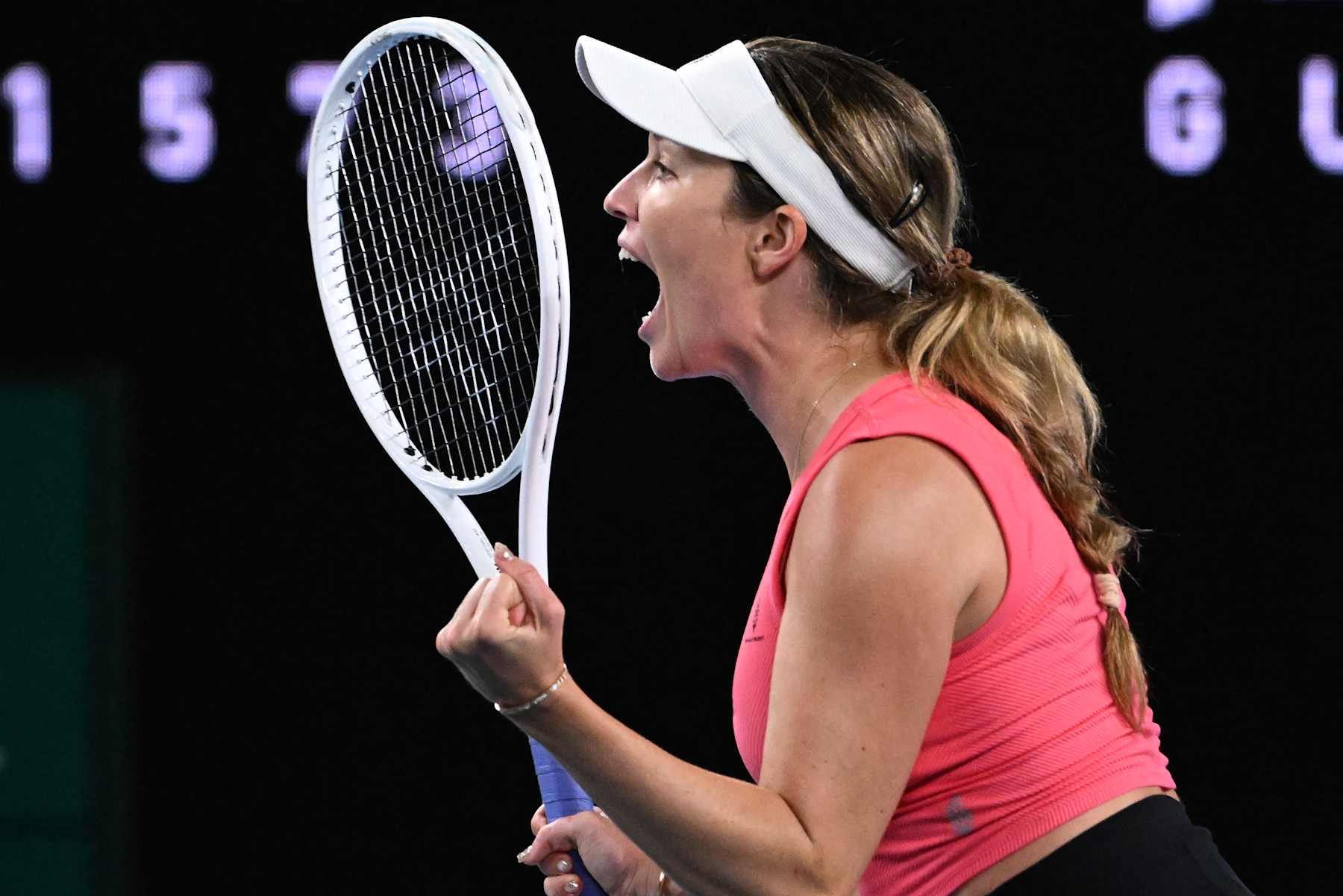 USA's Danielle Collins celebrates a point against Australia's Destanee Aiava during their women's singles match on day five of the Australian Open tennis tournament in Melbourne on January 16, 2025. (Photo by WILLIAM WEST / AFP) / -- IMAGE RESTRICTED TO EDITORIAL USE - STRICTLY NO COMMERCIAL USE -- (Photo by WILLIAM WEST/AFP via Getty Images)