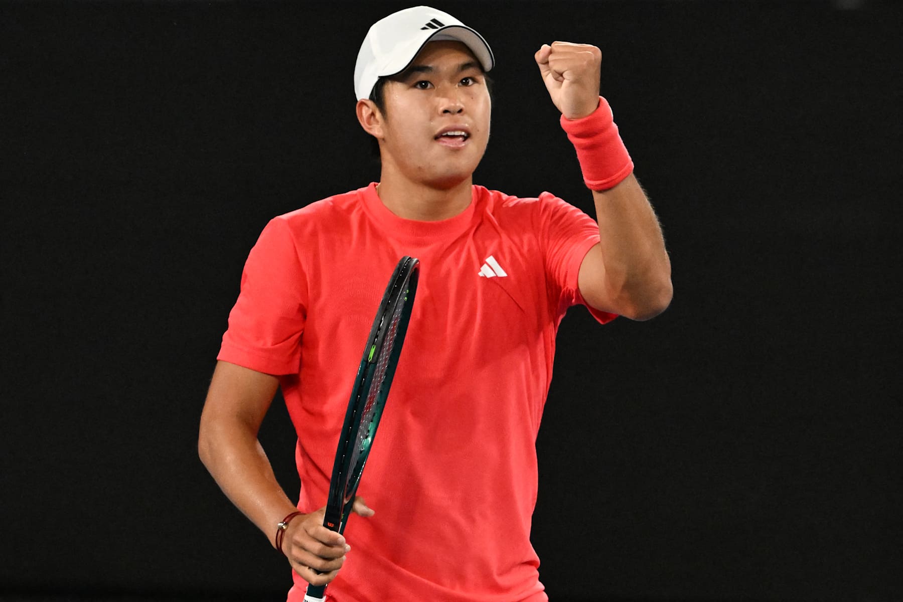 USA's Learner Tien reacts after a point against Russia's Daniil Medvedev during their men's singles match on day five of the Australian Open tennis tournament in Melbourne on January 17, 2025. (Photo by Paul Crock / AFP) / -- IMAGE RESTRICTED TO EDITORIAL USE - STRICTLY NO COMMERCIAL USE -- (Photo by PAUL CROCK/AFP via Getty Images)