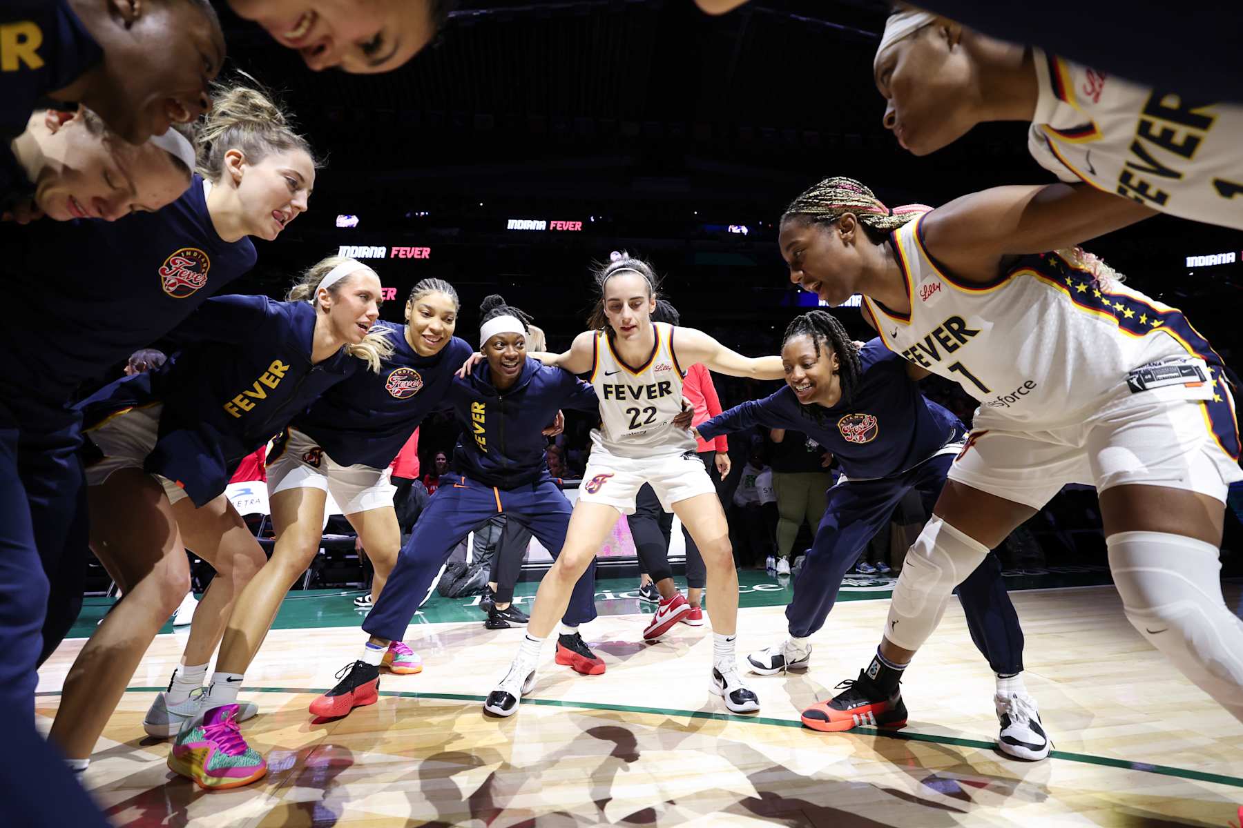 SEATTLE, WASHINGTON - MAY 22: Caitlin Clark #22 of the Indiana Fever huddles with teammates prior to a game \asea in the game at Climate Pledge Arena on May 22, 2024 in Seattle, Washington. NOTE TO USER: User expressly acknowledges and agrees that, by downloading and or using this photograph, User is consenting to the terms and conditions of the Getty Images License Agreement. (Photo by Steph Chambers/Getty Images)
