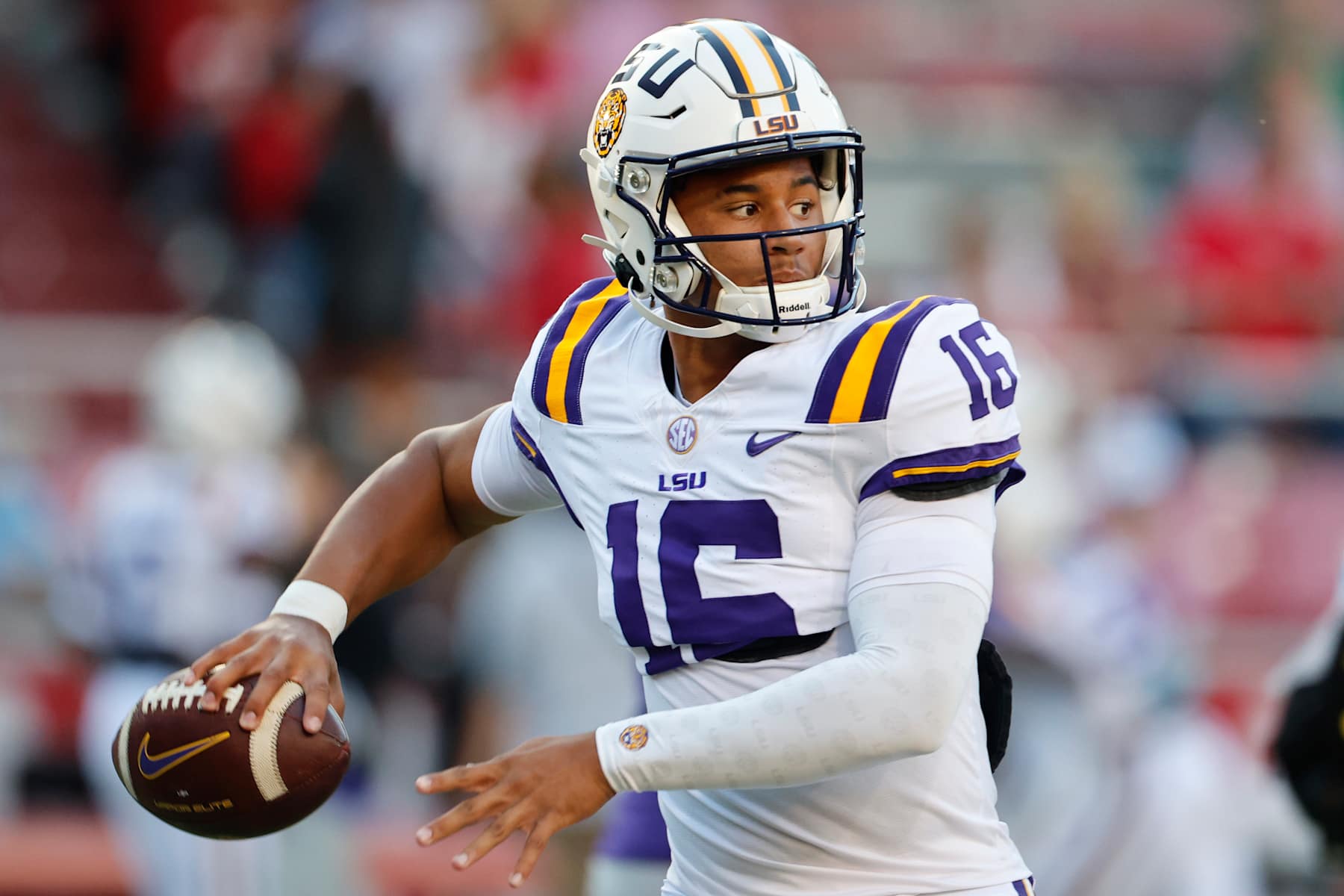 FAYETTEVILLE, AR - OCTOBER 19:  LSU Tigers quarterback Colin Hurley (16) sets to throw a pass before the college football game between the LSU Tigers and Arkansas Razorbacks on October 19, 2024, at Donald W. Reynolds Razorback Stadium in Fayetteville, Arkansas. (Photo by Andy Altenburger/Icon Sportswire via Getty Images)