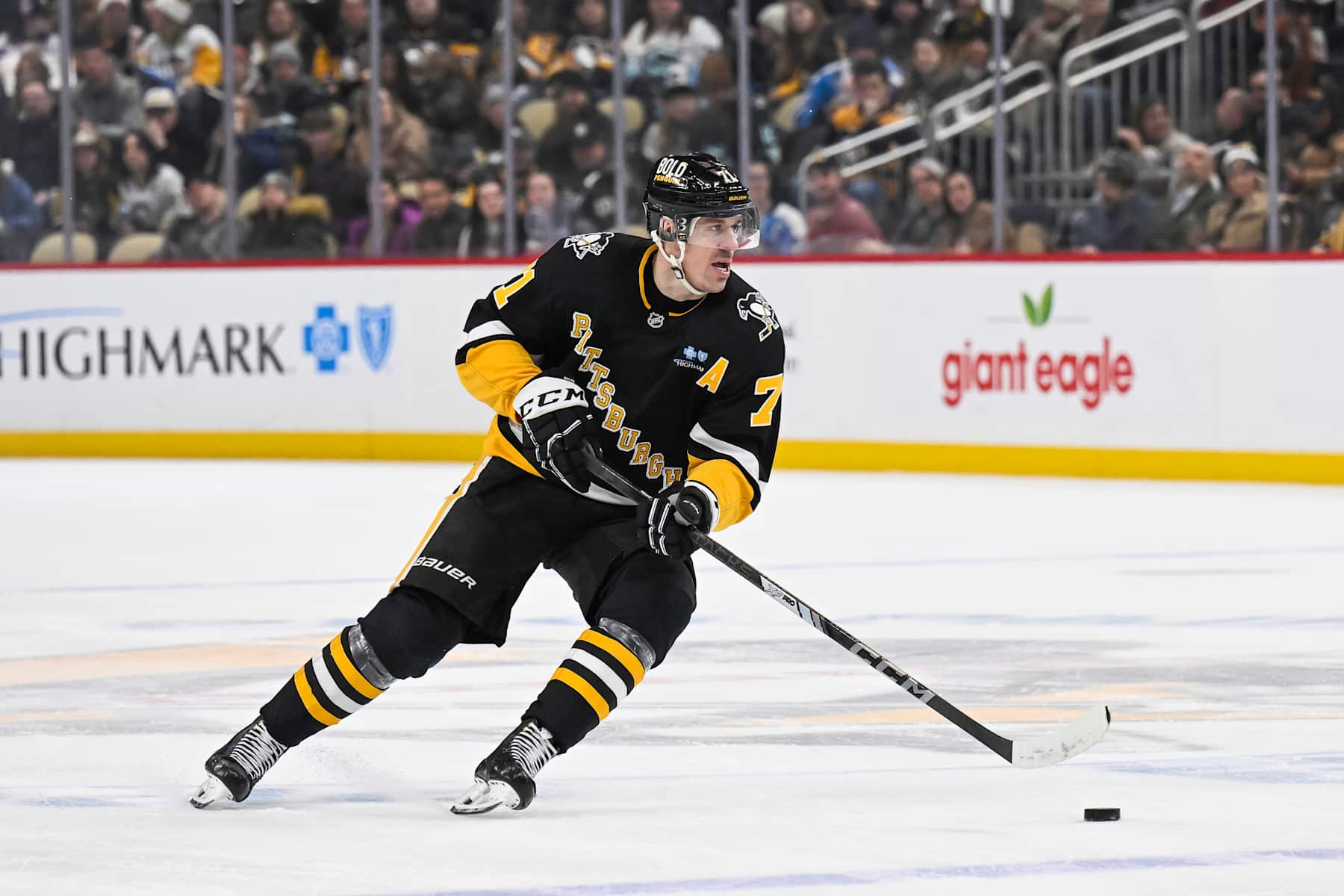 PITTSBURGH, PA - JANUARY 14: Pittsburgh Penguins center Evgeni Malkin (71) skates with the puck during the second period in the NHL game between the Pittsburgh Penguins and the Seattle Kraken on January 14, 2025, at PPG Paints Arena in Pittsburgh, PA. (Photo by Jeanine Leech/Icon Sportswire via Getty Images)