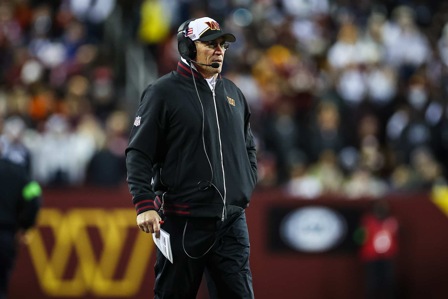 LANDOVER, MD - JANUARY 07: Head coach Ron Rivera of the Washington Commanders looks on against the Dallas Cowboys during the first half of the game at FedExField on January 7, 2024 in Landover, Maryland. (Photo by Scott Taetsch/Getty Images)