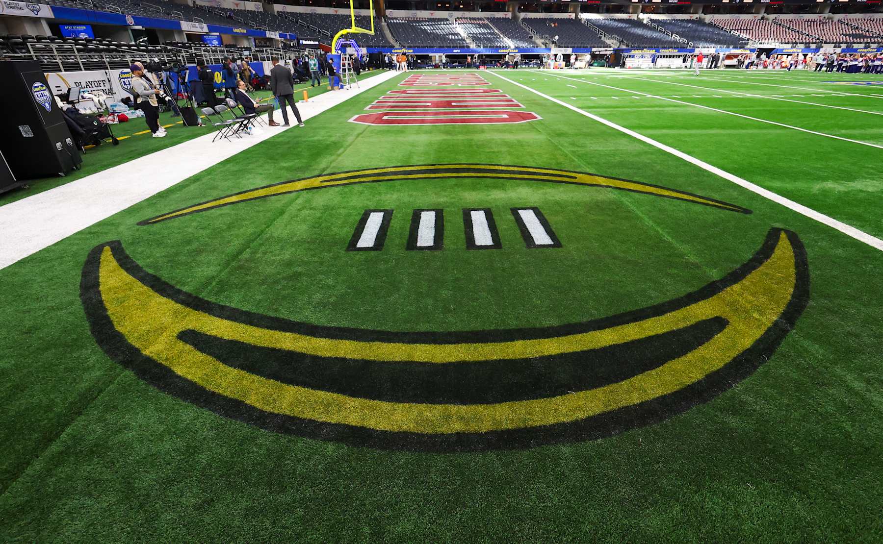 ARLINGTON, TEXAS - JANUARY 10: View of the CFP logo on the field before the game between the Texas Longhorns and Ohio State Buckeyes during the Goodyear Cotton Bowl at AT&T Stadium on January 10, 2025 in Arlington, Texas. (Photo by CFP/Getty Images)