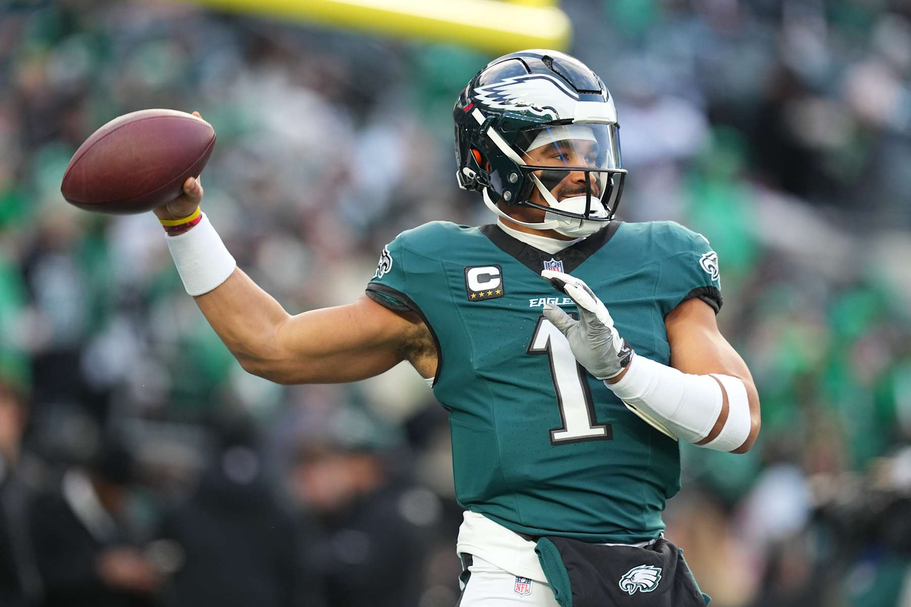 PHILADELPHIA, PENNSYLVANIA - JANUARY 12: Jalen Hurts #1 of the Philadelphia Eagles warms up prior to a game against the Green Bay Packers during the NFC Wild Card Playoff at Lincoln Financial Field on January 12, 2025 in Philadelphia, Pennsylvania.  (Photo by Mitchell Leff/Getty Images)