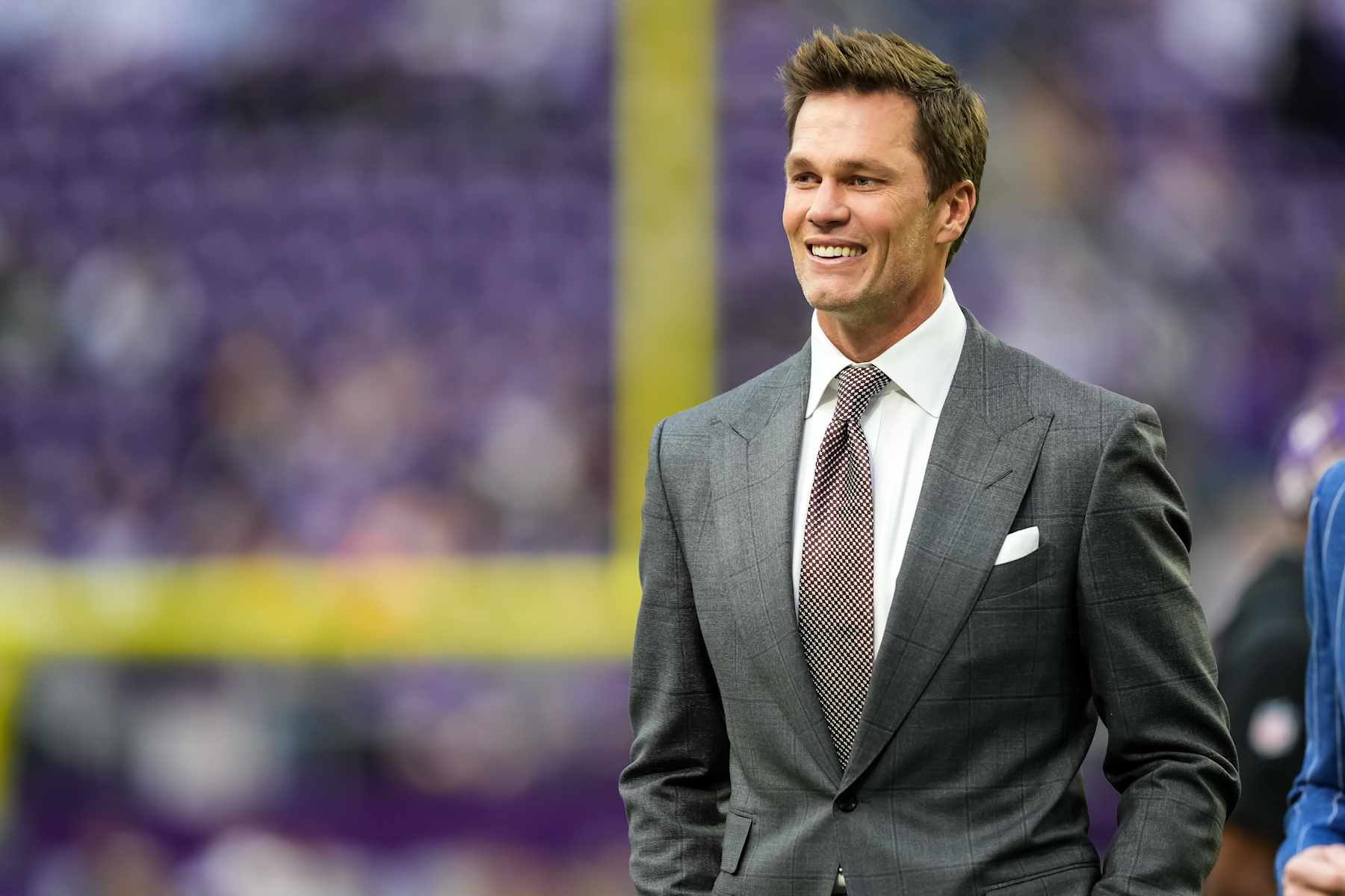 MINNEAPOLIS, MINNESOTA - DECEMBER 29: Former NFL player Tom Brady looks on prior to a game between the Minnesota Vikings and Green Bay Packers at U.S. Bank Stadium on December 29, 2024 in Minneapolis, Minnesota. (Photo by Brace Hemmelgarn/Getty Images)