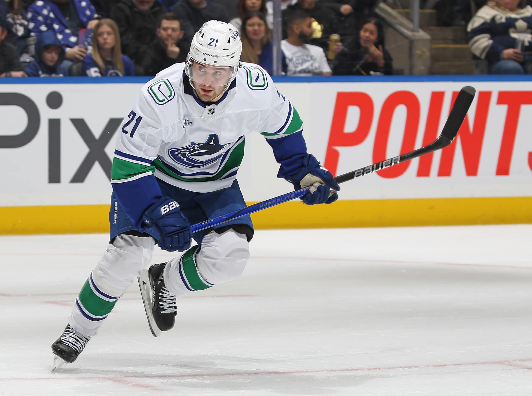 TORONTO, CANADA - JANUARY 11: Nils Hoglander #21 of the Vancouver Canucks skates against the Toronto Maple Leafs during the first period in an NHL game at Scotiabank Arena on January 11, 2025 in Toronto, Ontario, Canada. (Photo by Claus Andersen/Getty Images)