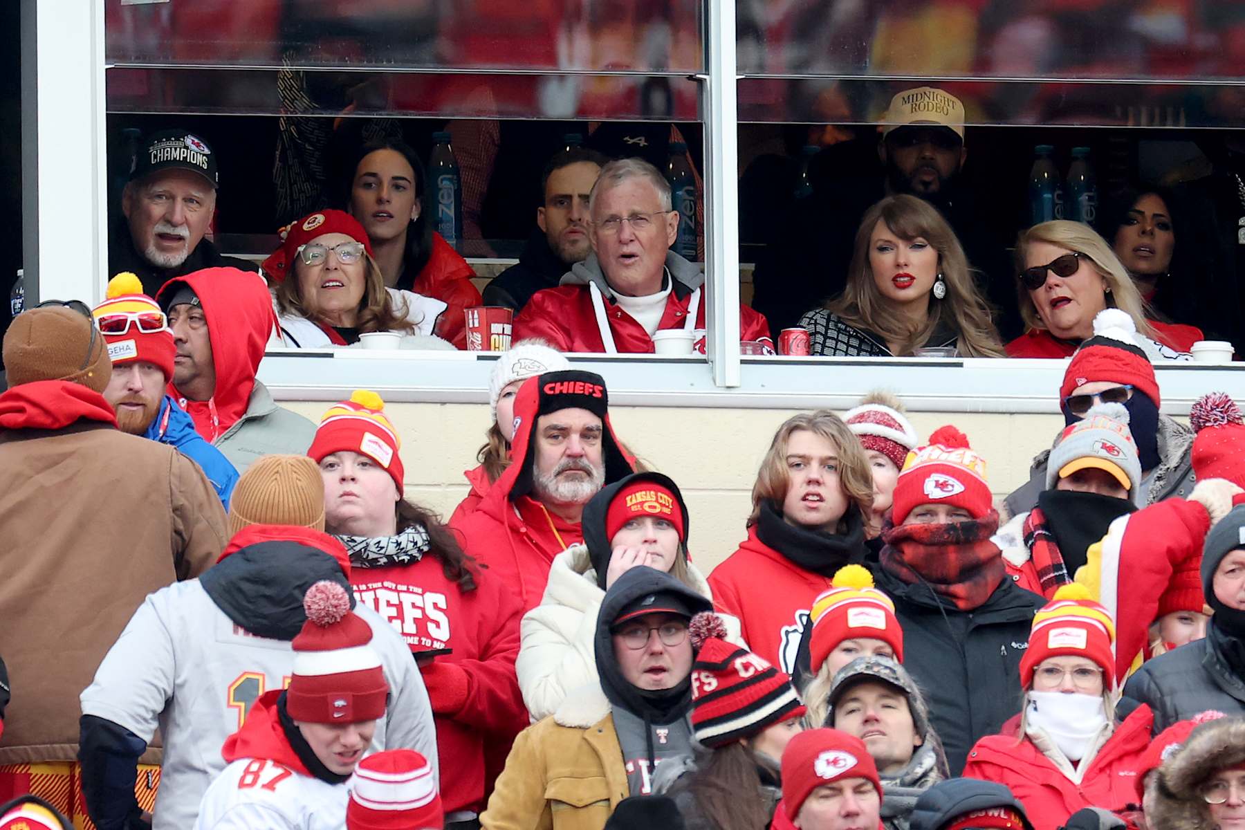 KANSAS CITY, MISSOURI - JANUARY 18: Singer-songwriter Taylor Swift looks on during the first half in the AFC Divisional Playoff between the Houston Texans and the Kansas City Chiefs at GEHA Field at Arrowhead Stadium on January 18, 2025 in Kansas City, Missouri. (Photo by Jamie Squire/Getty Images)