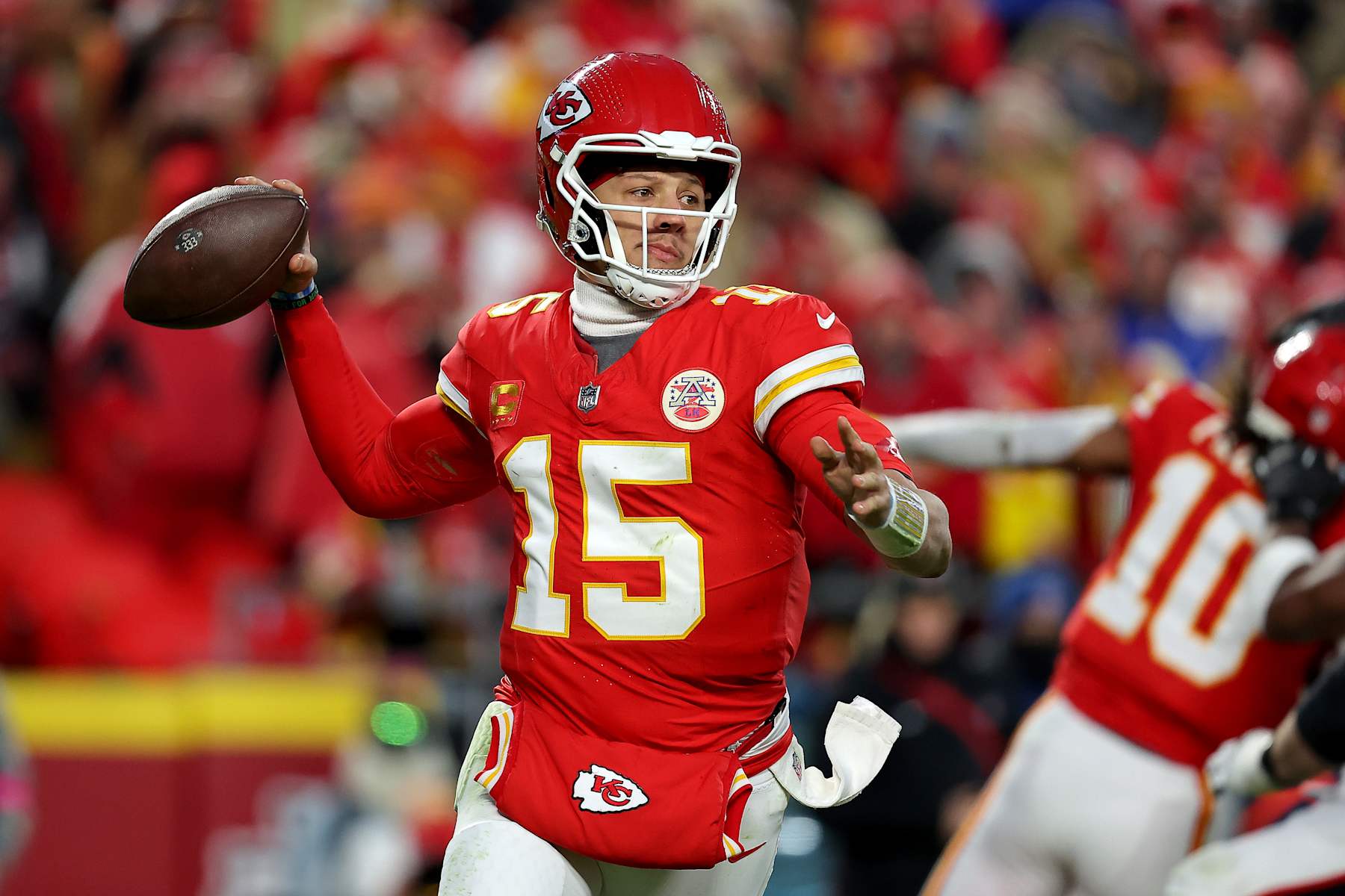 KANSAS CITY, MISSOURI - JANUARY 18: Patrick Mahomes #15 of the Kansas City Chiefs looks to pass against the Houston Texans during the third quarter in the AFC Divisional Playoff at GEHA Field at Arrowhead Stadium on January 18, 2025 in Kansas City, Missouri. (Photo by David Eulitt/Getty Images)