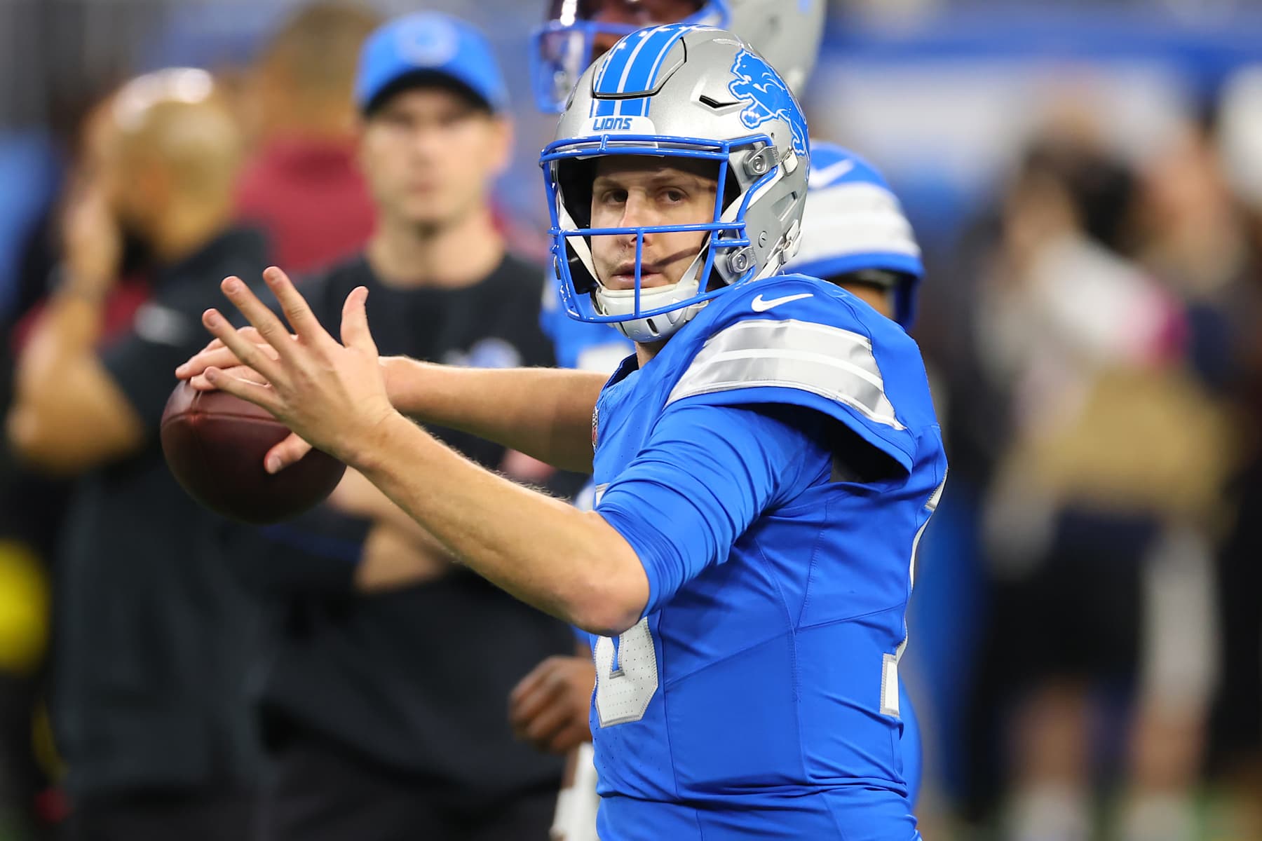 DETROIT, MICHIGAN - JANUARY 18: Jared Goff #16 of the Detroit Lions warms up prior to the NFC Divisional Playoff against the Washington Commanders at Ford Field on January 18, 2025 in Detroit, Michigan.  (Photo by Gregory Shamus/Getty Images)