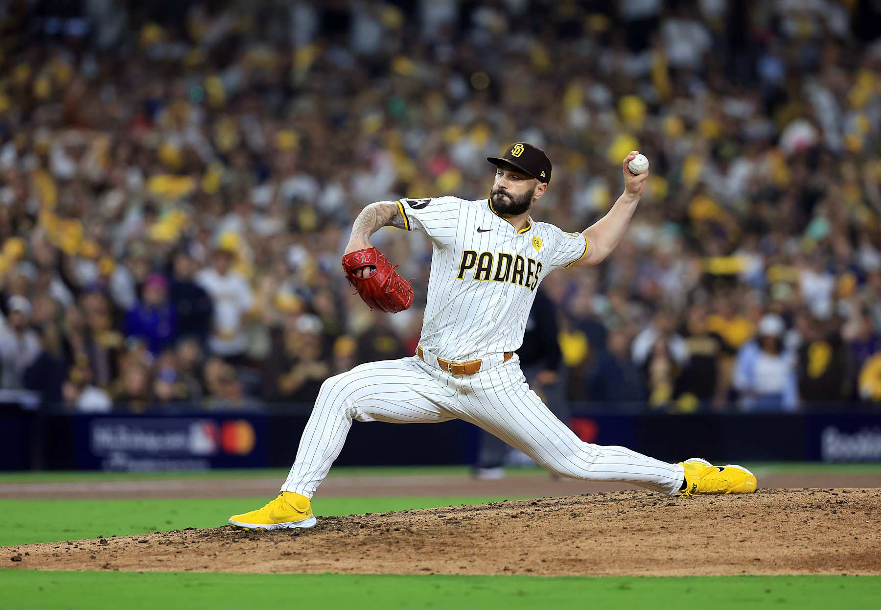 SAN DIEGO, CALIFORNIA - OCTOBER 08: Tanner Scott #66 of the San Diego Padres pitches in the eighth inning against the Los Angeles Dodgers during Game Three of the Division Series at Petco Park on October 08, 2024 in San Diego, California. (Photo by Sean M. Haffey/Getty Images)