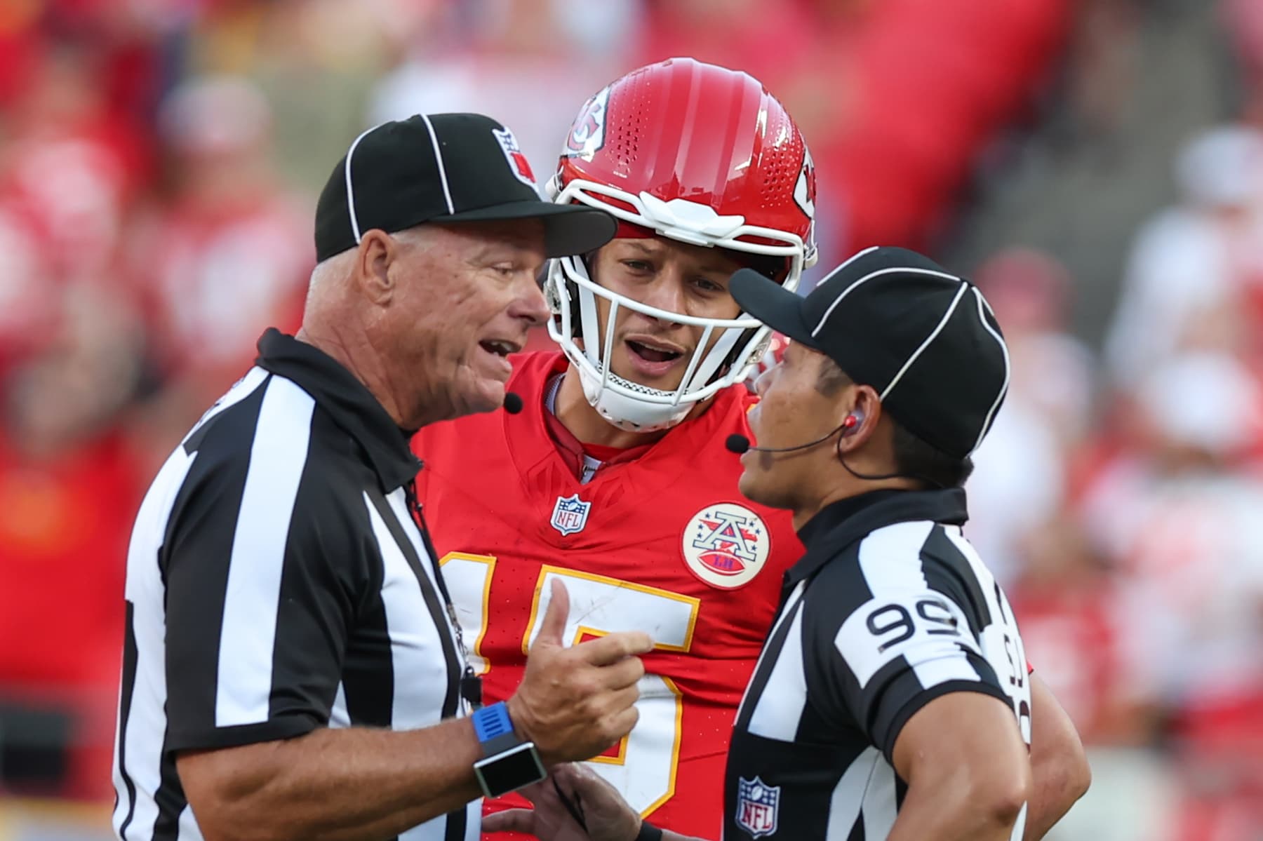 KANSAS CITY, MO - SEPTEMBER 15: Kansas City Chiefs quarterback Patrick Mahomes (15) looks in as the referees discuss a pass interference call on 4th and 16 late in the fourth quarter of an NFL game between the Cincinnati Bengals and Kansas City Chiefs on September 15, 2024 at GEHA Field at Arrowhead Stadium in Kansas City, MO. (Photo by Scott Winters/Icon Sportswire via Getty Images)
