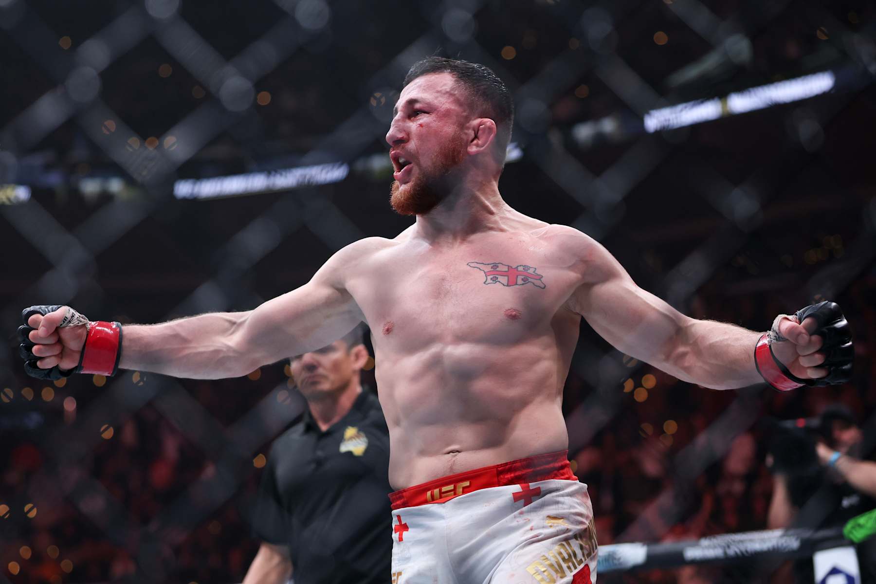 Merab Dvalishvili reacts at the end of his bantamweight title fight against Umar Nurmagomedov