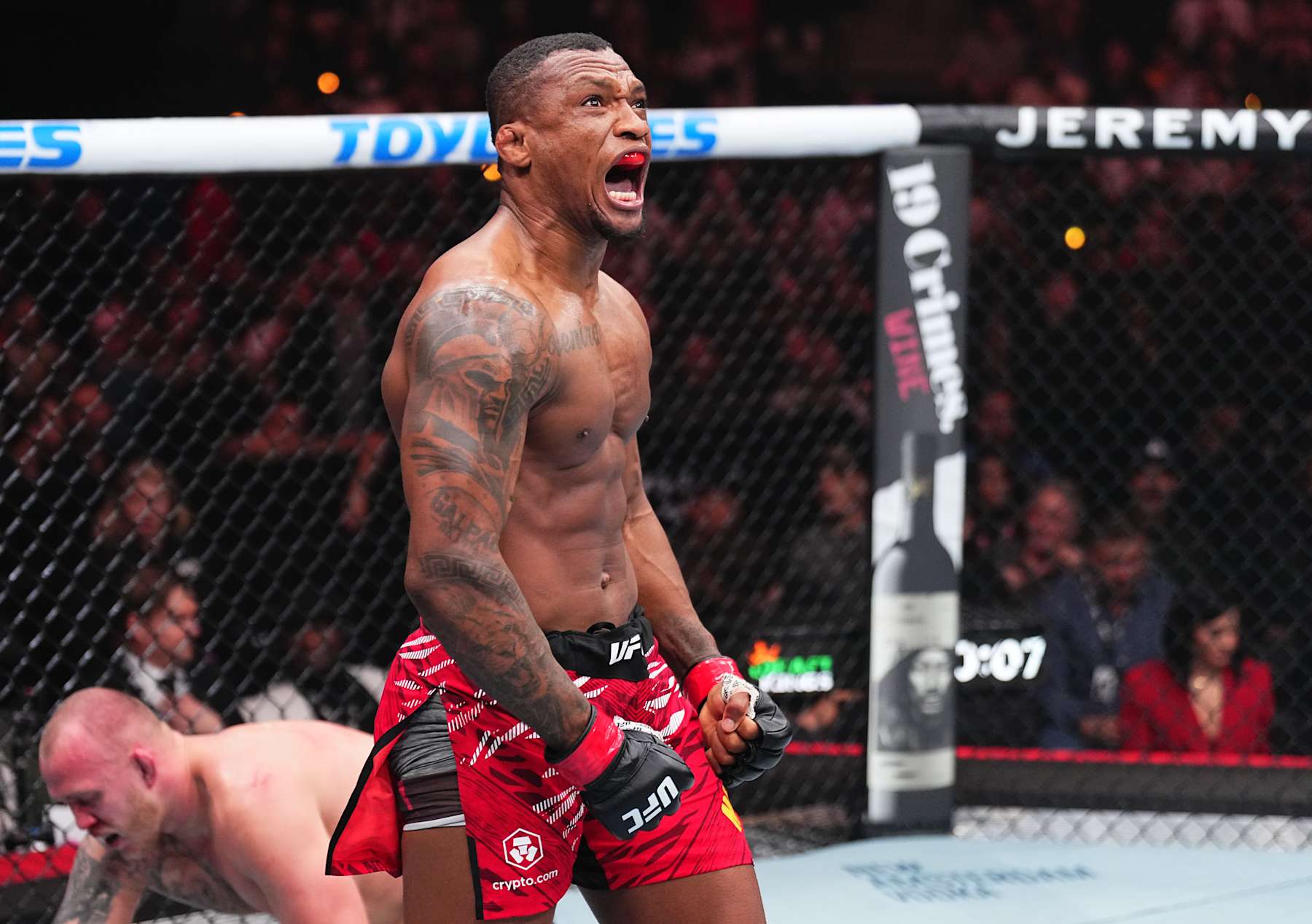 Jailton Almeida reacts after a TKO victory against Serghei Spivac