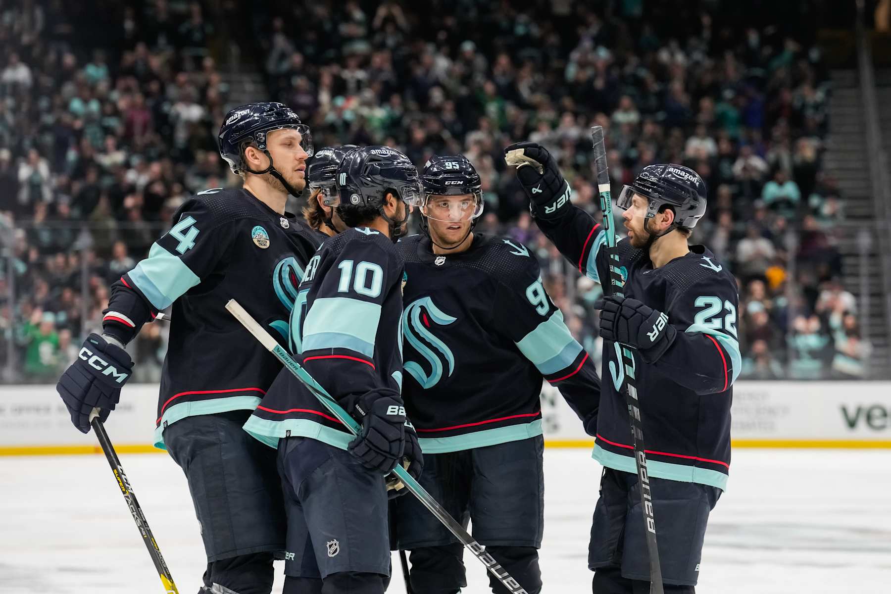 SEATTLE, WASHINGTON - APRIL 09: The Seattle Kraken celebrate a goal against the Arizona Coyotes during the third period of a game at Climate Pledge Arena on April 09, 2024 in Seattle, Washington. (Photo by Christopher Mast/NHLI via Getty Images)