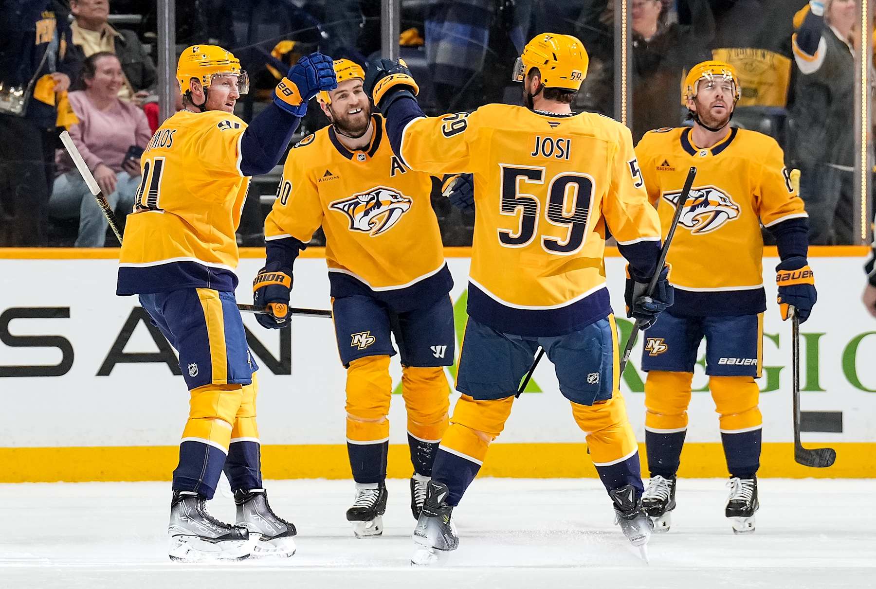 NASHVILLE, TENNESSEE - JANUARY 16: Steven Stamkos #91 celebrates his goal with Roman Josi #59, Ryan O'Reilly #90 and Jonathan Marchessault #81 of the Nashville Predators against the Chicago Blackhawks during an NHL game at Bridgestone Arena on January 16, 2025 in Nashville, Tennessee. (Photo by John Russell/NHLI via Getty Images)