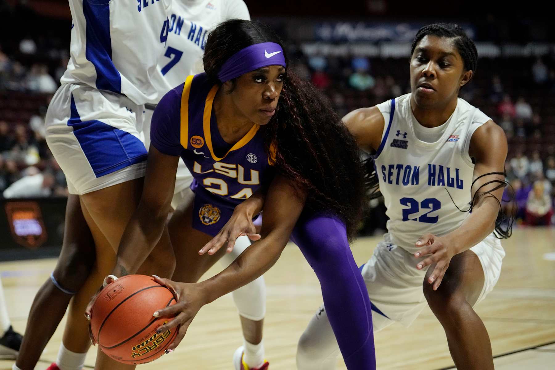 UNCASVILLE, CONNECTICUT - DECEMBER 17: Aneesah Morrow #24 of the LSU Tigers is defended by Amari Wright #22 of the Seton Hall Pirates during the first half of an Invesco QQQ Basketball Hall of Fame Women’s Showcase game at Mohegan Sun Arena on December 17, 2024 in Uncasville, Connecticut. (Photo by Joe Buglewicz/Getty Images)