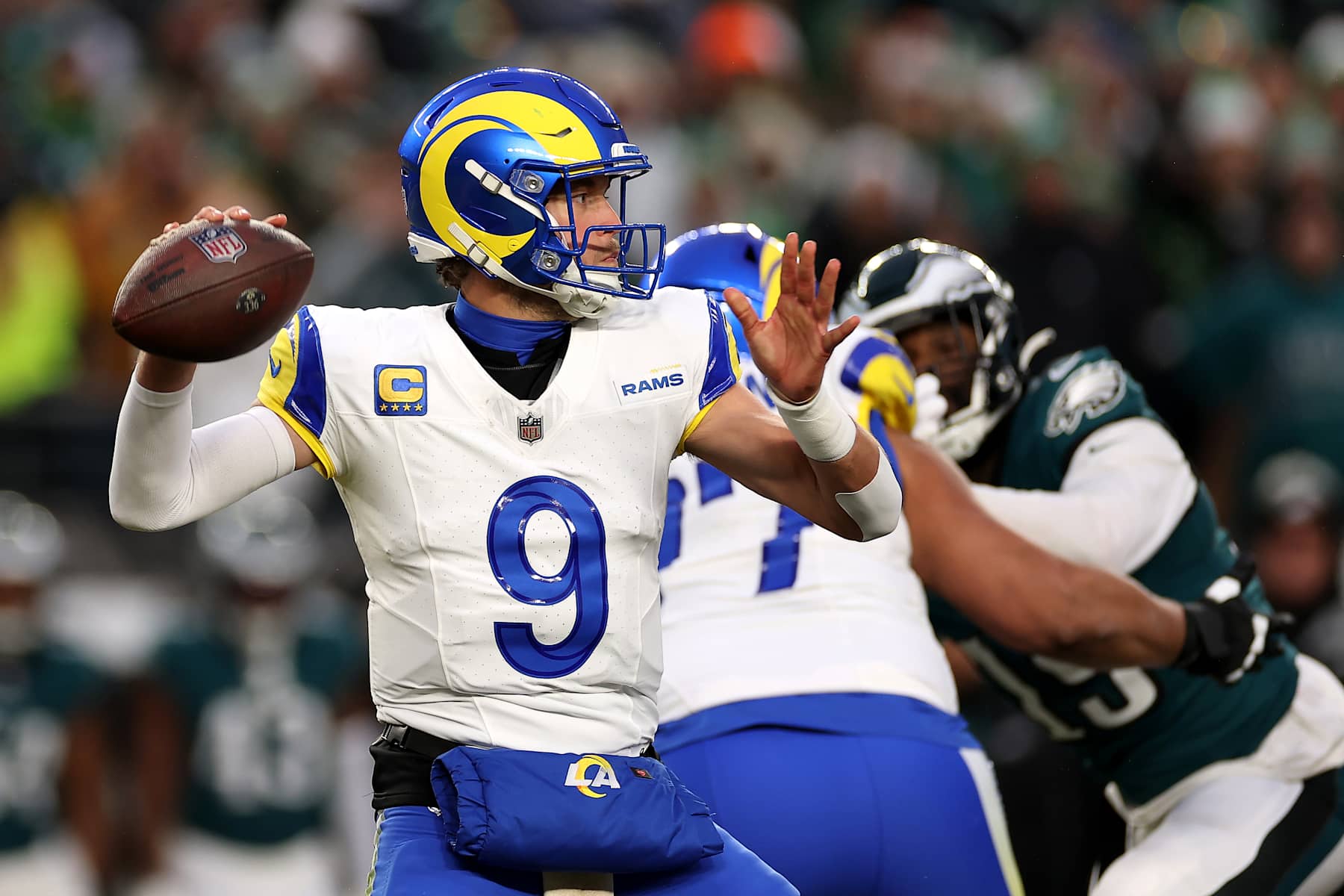PHILADELPHIA, PENNSYLVANIA - JANUARY 19: Matthew Stafford #9 of the Los Angeles Rams throws a pass against the Philadelphia Eagles during the first quarter during the NFC Divisional Playoff at Lincoln Financial Field on January 19, 2025 in Philadelphia, Pennsylvania. (Photo by Sarah Stier/Getty Images)