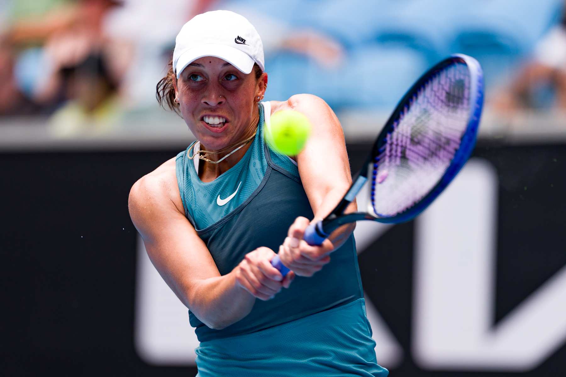 MELBOURNE, AUSTRALIA - JANUARY 20: Madison Keys of the United States plays a backhand in the Women's Singles Fourth Round match against Elena Rybakina of Kazakhstan during day nine of the 2025 Australian Open at Melbourne Park on January 20, 2025 in Melbourne, Australia. (Photo by Andy Cheung/Getty Images)