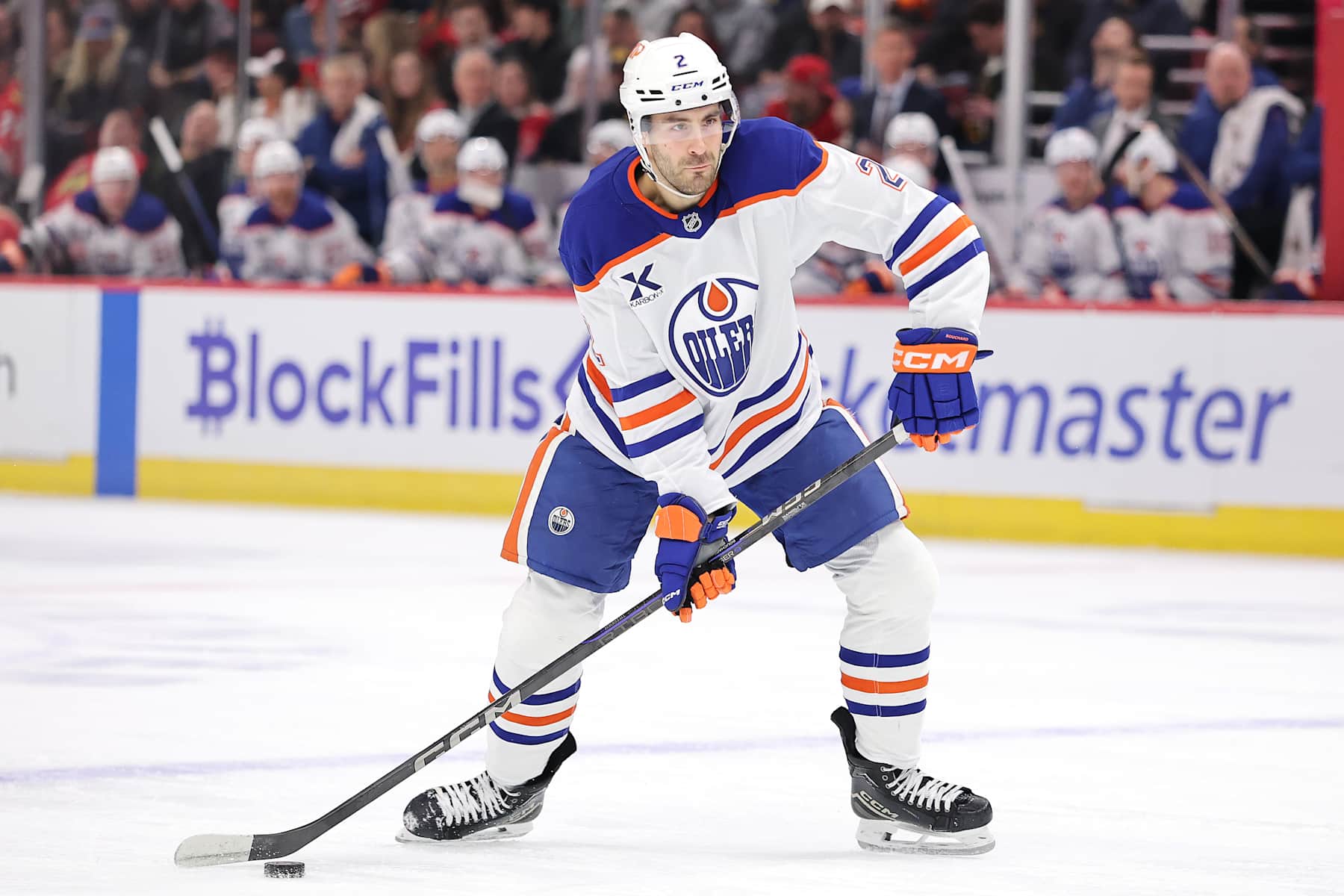 CHICAGO, ILLINOIS - JANUARY 11: Evan Bouchard #2 of the Edmonton Oilers skates with the puck against the Chicago Blackhawks during the first period at the United Center on January 11, 2025 in Chicago, Illinois. (Photo by Michael Reaves/Getty Images)