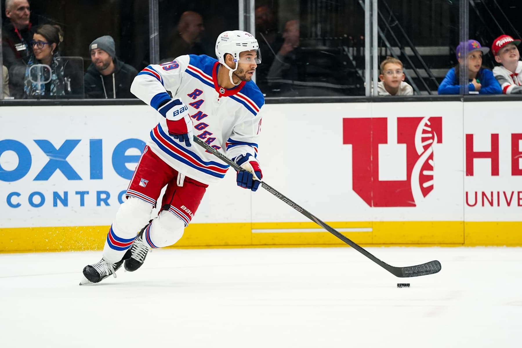 SALT LAKE CITY, UT - JANUARY 16: New York Rangers defenseman K'Andre Miller (79) turns up ice with the puck during an NHL game between the New York Rangers and the Utah Hockey Club on January 16, 2025 at the Delta Center in Salt Lake City, UT. (Photo by Aaron Baker/Icon Sportswire via Getty Images)