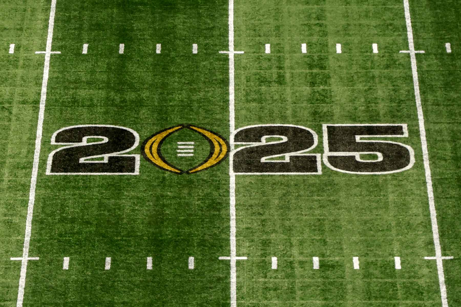 ATLANTA, GA - JANUARY 19: A general view of the CFP logo at mid-field inside the Mercedes-Benz Stadium prior to the start of  the College Football Playoffs Championship Game between the Notre Dame Fighting Irish and the Ohio State Buckeyes on January 19, 2025 in Atlanta, Georgia. (Photo by Don Juan Moore/Getty Images)