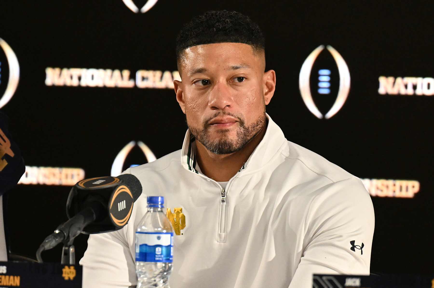 ATLANTA, GEORGIA - JANUARY 20: Head coach Marcus Freeman of the Notre Dame Fighting Irish speaks during a press conference after the 2025 CFP National Championship game against the Ohio State Buckeyes at Mercedes-Benz Stadium on January 20, 2025 in Atlanta, Georgia. Notre Dame Fighting Irish defeated the Ohio State Buckeyes 34-23. (Photo by Paras Griffin/Getty Images)