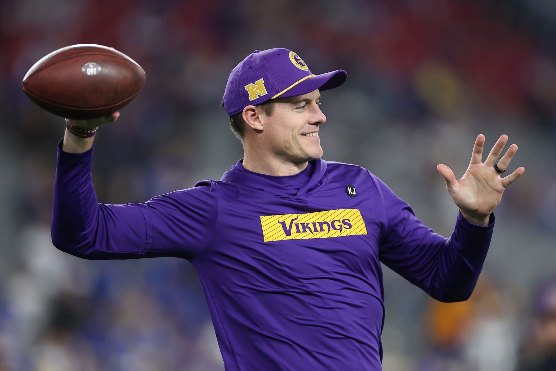 GLENDALE, ARIZONA - JANUARY 13: Head coach Kevin O’Connell of the Minnesota Vikings throws the ball prior to the NFC Wild Card Playoff game against the Los Angeles Rams at State Farm Stadium on January 13, 2025 in Glendale, Arizona.  (Photo by Christian Petersen/Getty Images)