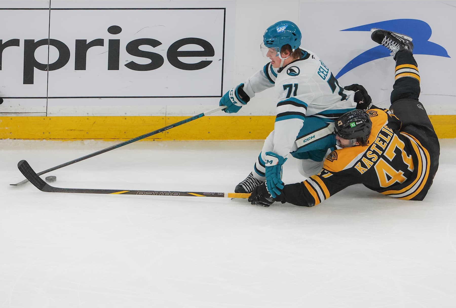 Boston, MA - January 20: Boston Bruins C Mark Kastelic defends San Jose Sharks C Macklin Celebrini in the second period. (Photo by Matthew J. Lee/The Boston Globe via Getty Images)
