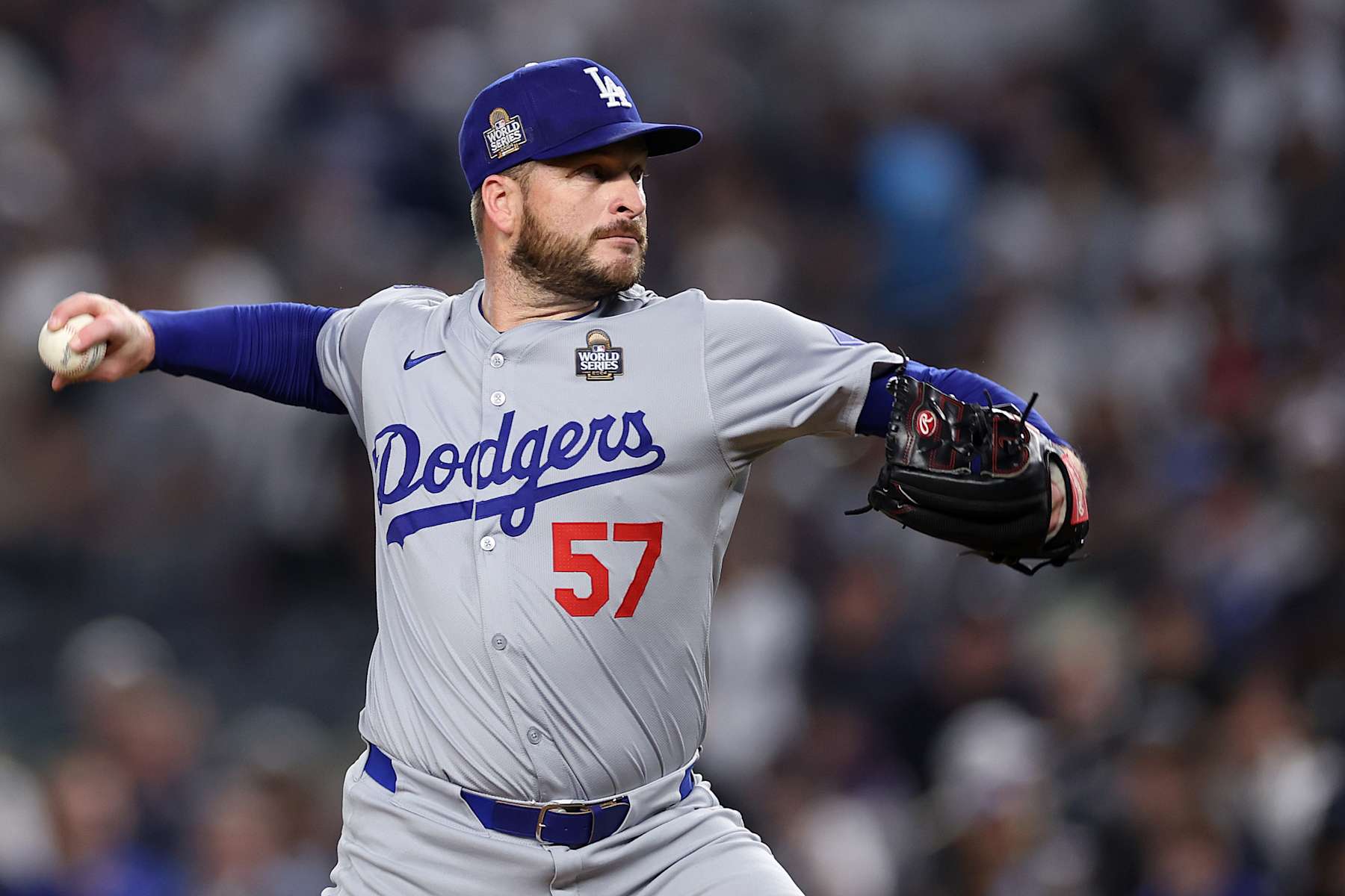 NEW YORK, NEW YORK - OCTOBER 30:  Ryan Brasier #57 of the Los Angeles Dodgers pitches during the third inning of Game Five of the 2024 World Series against the New York Yankees at Yankee Stadium on October 30, 2024 in the Bronx borough of New York City. (Photo by Sarah Stier/Getty Images)
