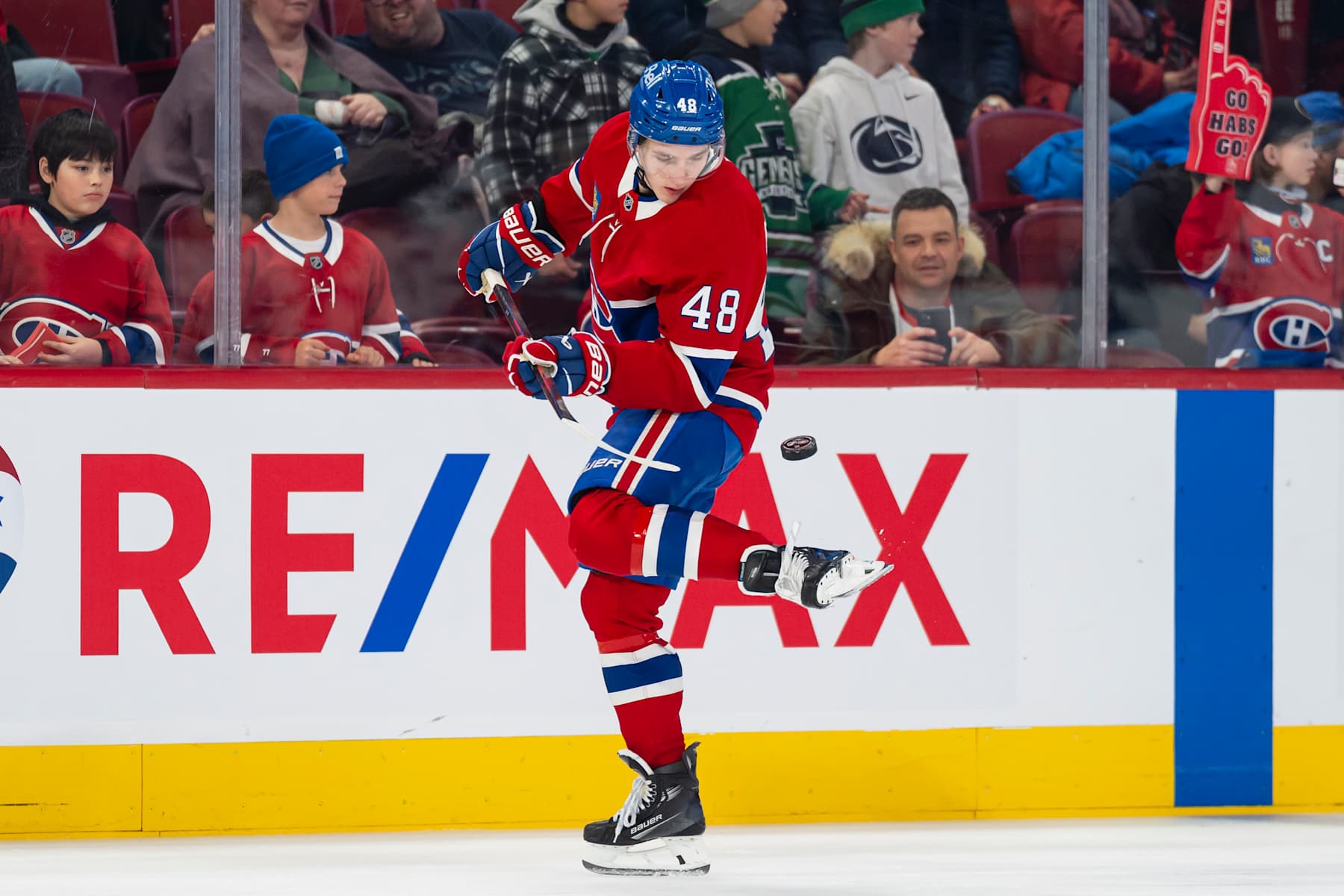MONTREAL, CANADA - JANUARY 21: Lane Hutson #48 of the Montreal Canadiens juggles the puck on his skate before the game against the Tampa Bay Lightning at the Bell Centre on January 21, 2025 in Montreal, Quebec, Canada. (Photo by Arianne Bergeron/NHLI via Getty Images)