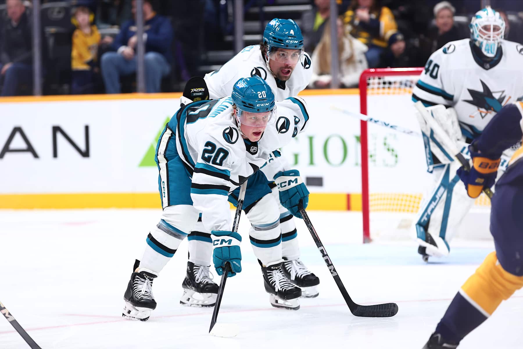 NASHVILLE, TENNESSEE - JANUARY 21: Fabian Zetterlund of the San Jose Sharks and Cody Ceci of the San Jose Sharks look onto the face-off circle in the second period of the game agains the Nashville Predators on January 21, 2025 at Bridgestone Arena in Nashville. (Photo by Casey Gower/NHLI via Getty Images)