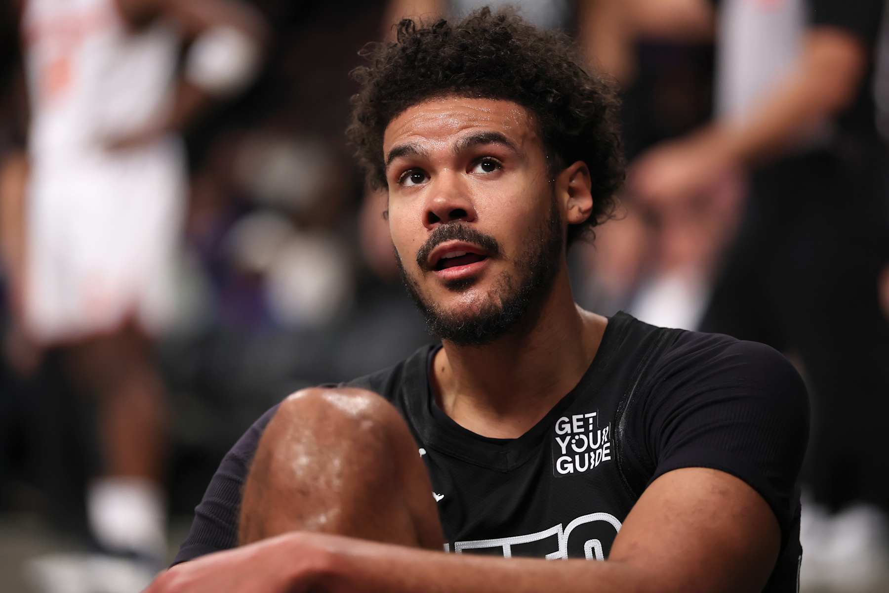 NEW YORK, NEW YORK - JANUARY 21:  Cameron Johnson #2 of the Brooklyn Nets takes a moment after a hard foul by the New York Knicks at Barclays Center on January 21, 2025 in the Brooklyn borough of New York City. NOTE TO USER: User expressly acknowledges and agrees that, by downloading and or using this photograph, User is consenting to the terms and conditions of the Getty Images License Agreement. (Photo by Elsa/Getty Images)