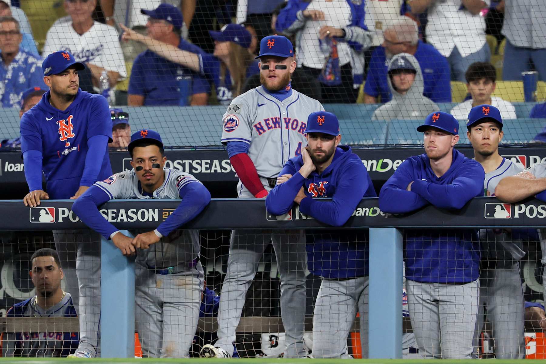 LOS ANGELES, CALIFORNIA - OCTOBER 20: The New York Mets watch from the dugout during the ninth inning in game six of the National League Championship Series against the Los Angeles Dodgers at Dodger Field on Sunday, Oct. 20, 2024 in Los Angeles. (Robert Gauthier / Los Angeles Times via Getty Images)