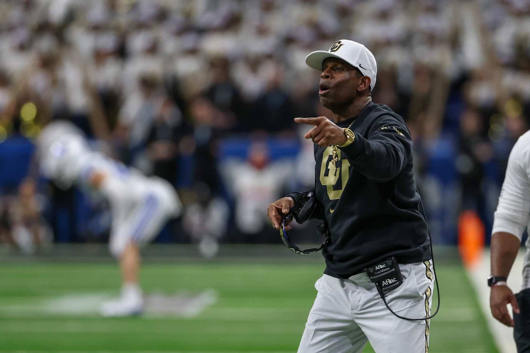 SAN ANTONIO, TX - DECEMBER 28: Colorado Buffaloes head coach Deion Sanders yells to players on the field during the football game between BYU Cougars and Colorado Buffalos on December 28, 2024, at the Alamodome in San Antonio, Texas. (Photo by David Buono/Icon Sportswire via Getty Images)