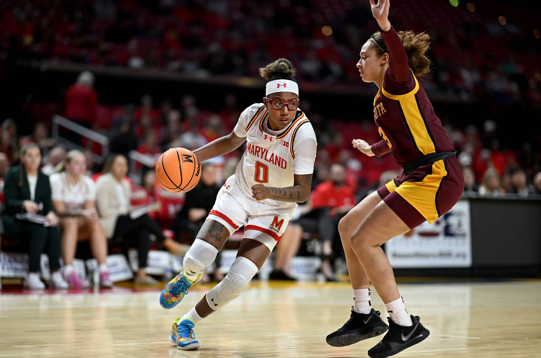 COLLEGE PARK, MARYLAND - JANUARY 14: Shyanne Sellers #0 of the Maryland Terrapins handles the ball in third quarter against Amaya Battle #3 of the Minnesota Golden Gophers at Xfinity Center on January 14, 2025 in College Park, Maryland.  (Photo by G Fiume/Getty Images)