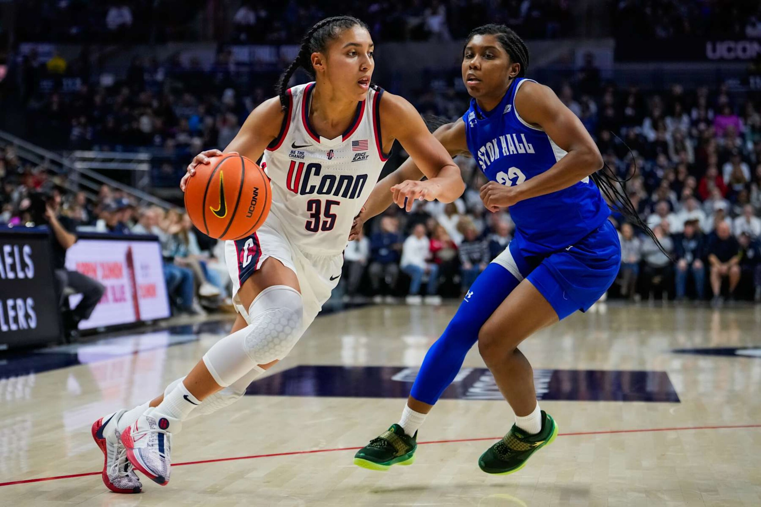 STORRS, CONNECTICUT - JANUARY 19: Azzi Fudd #35 of the Connecticut Huskies is defended by Amari Wright #22 of the Seton Hall Pirates during the first half of an NCAA women's basketball game at the Harry A. Gampel Pavilion on January 19, 2025 in Storrs, Connecticut. (Photo by Joe Buglewicz/Getty Images)