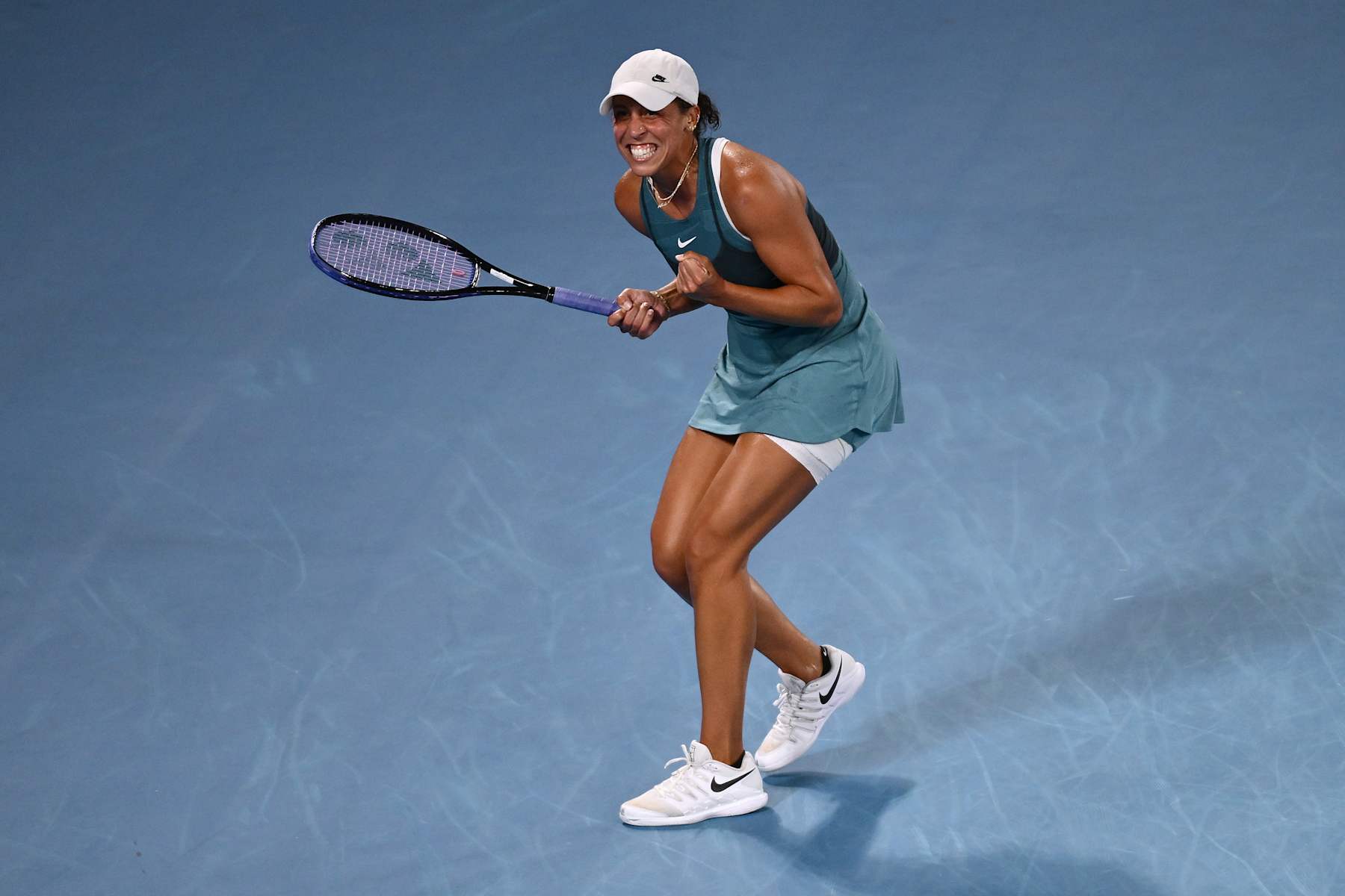 MELBOURNE, AUSTRALIA - JANUARY 23: Madison Keys of the United States celebrates winning the match point against Iga Swiatek of Poland in the Women's Singles Semifinal during day 12 of the 2025 Australian Open at Melbourne Park on January 23, 2025 in Melbourne, Australia. (Photo by Hannah Peters/Getty Images)