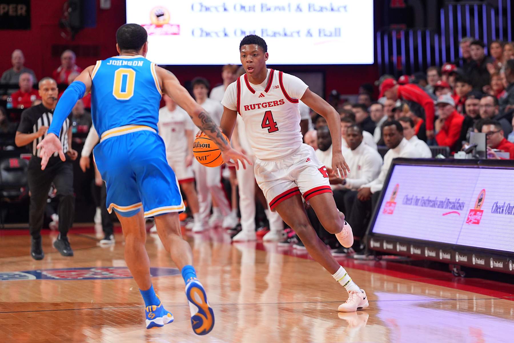 PISCATAWAY, NJ - JANUARY 13: Ace Bailey #4 of the Rutgers Scarlet Knights controls the ball during the first half the game of the game against the UCLA Bruins on January 13, 2025 at Jersey Mikes Arena in Piscataway, New Jersey. (Photo by Rich Graessle/Icon Sportswire via Getty Images)