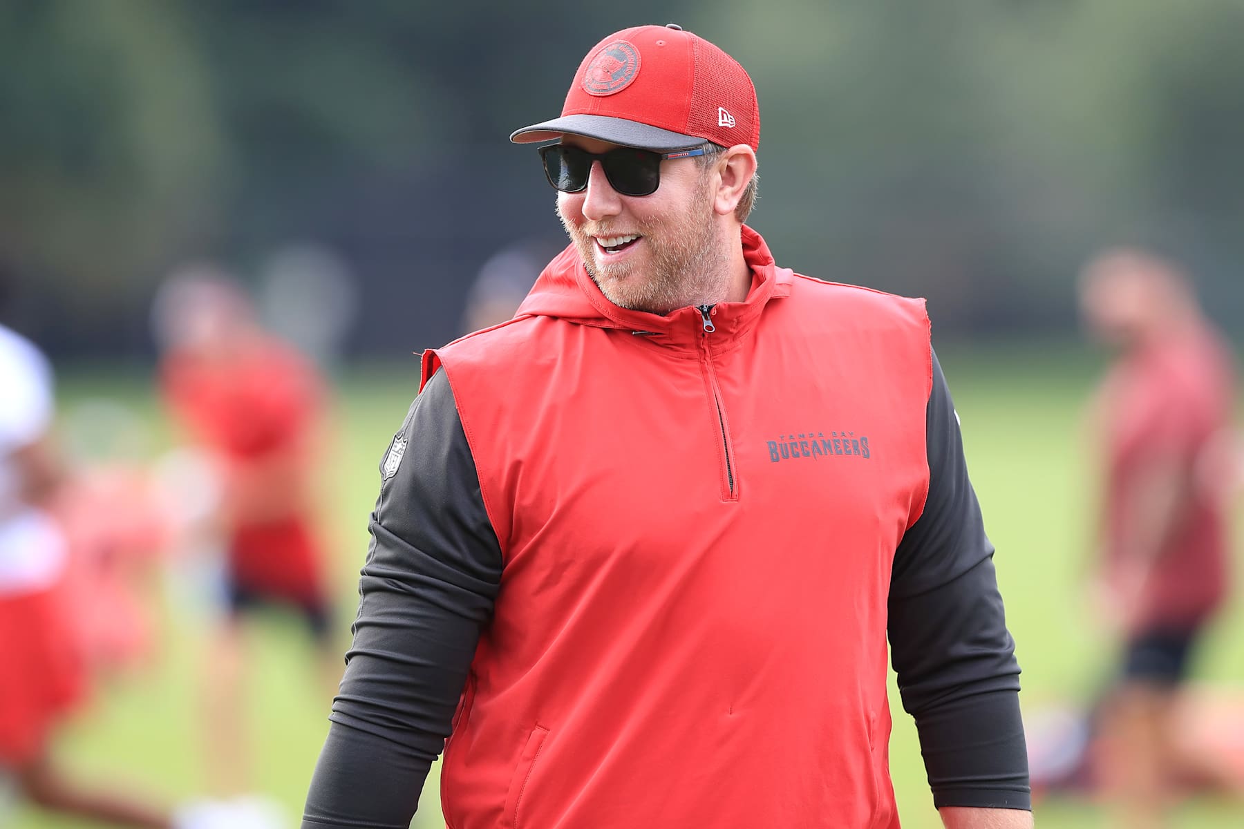 TAMPA, FL - JUL 25: Tampa Bay Buccaneers Offensive Coordinator Liam Coen smiles during Training Camp on July 25, 2024 at the AdventHealth Training Center at One Buccaneer Place in Tampa, Florida. (Photo by Cliff Welch/Icon Sportswire via Getty Images)