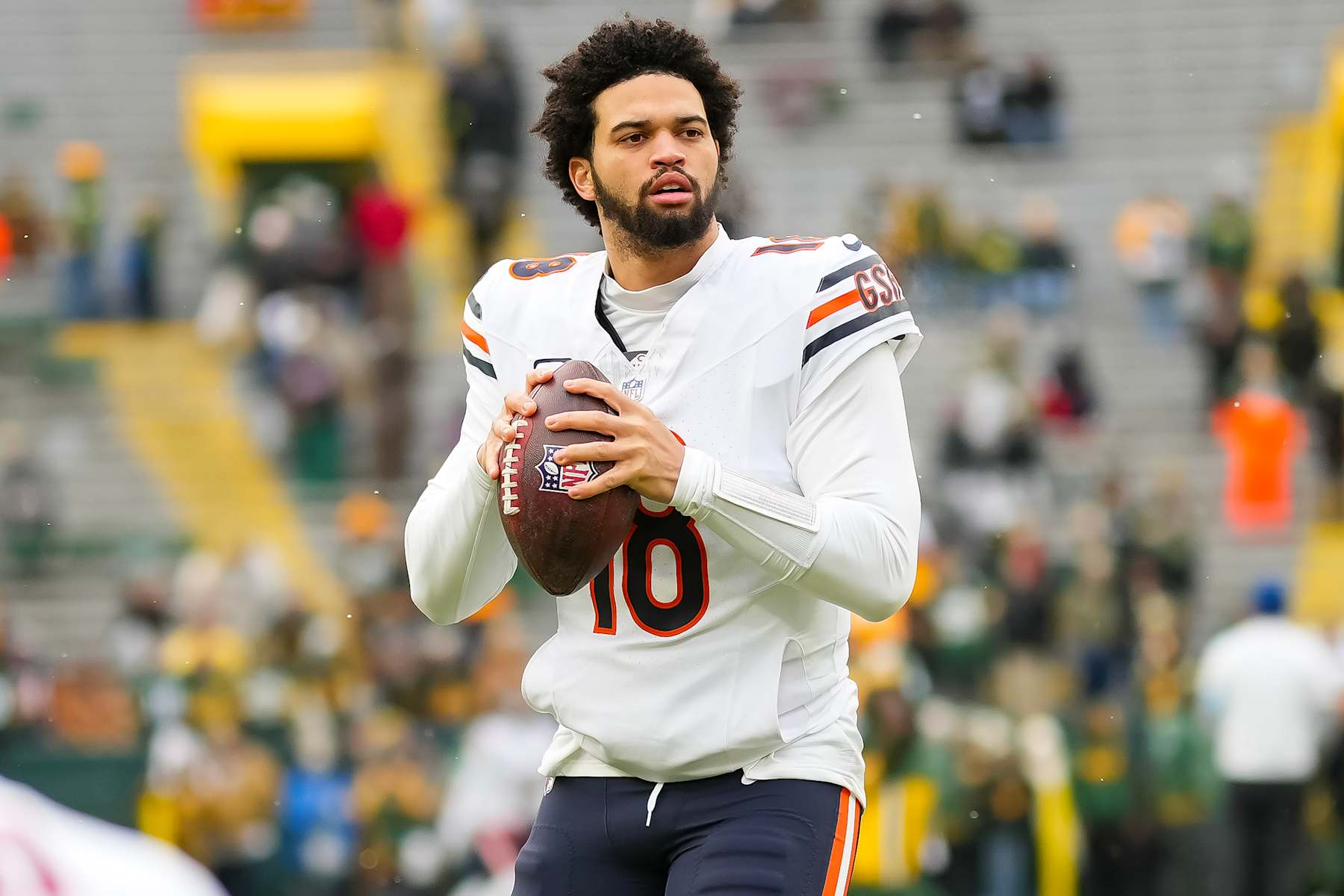 GREEN BAY, WISCONSIN - JANUARY 5: Quarterback Caleb Williams #18 of the Chicago Bears warms up prior to an NFL football game against the Green Bay Packers, at Lambeau Field on January 5, 2025 in Green Bay, Wisconsin. (Photo by Todd Rosenberg/Getty Images)